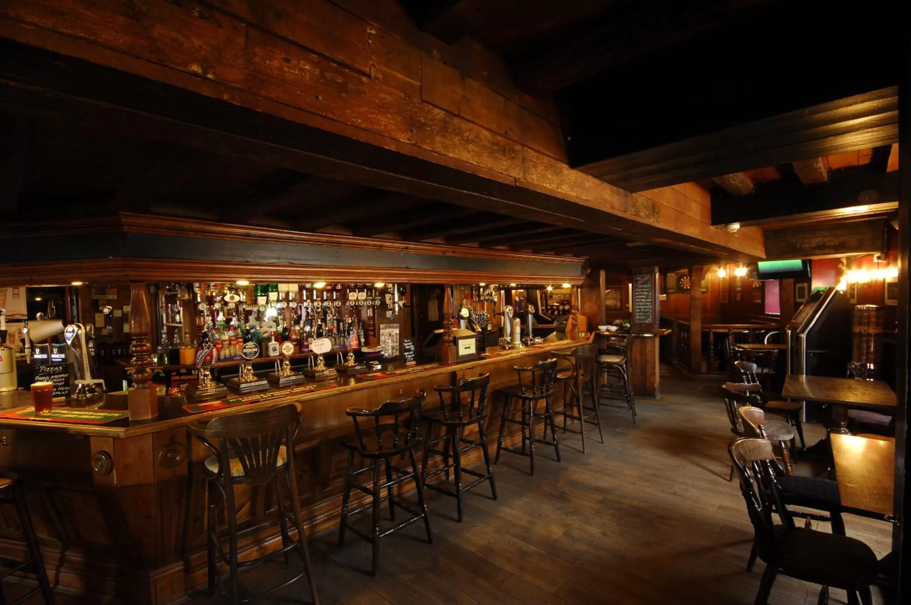 Lounge or bar in The Longboat Inn Lounge or bar in The Longboat Inn