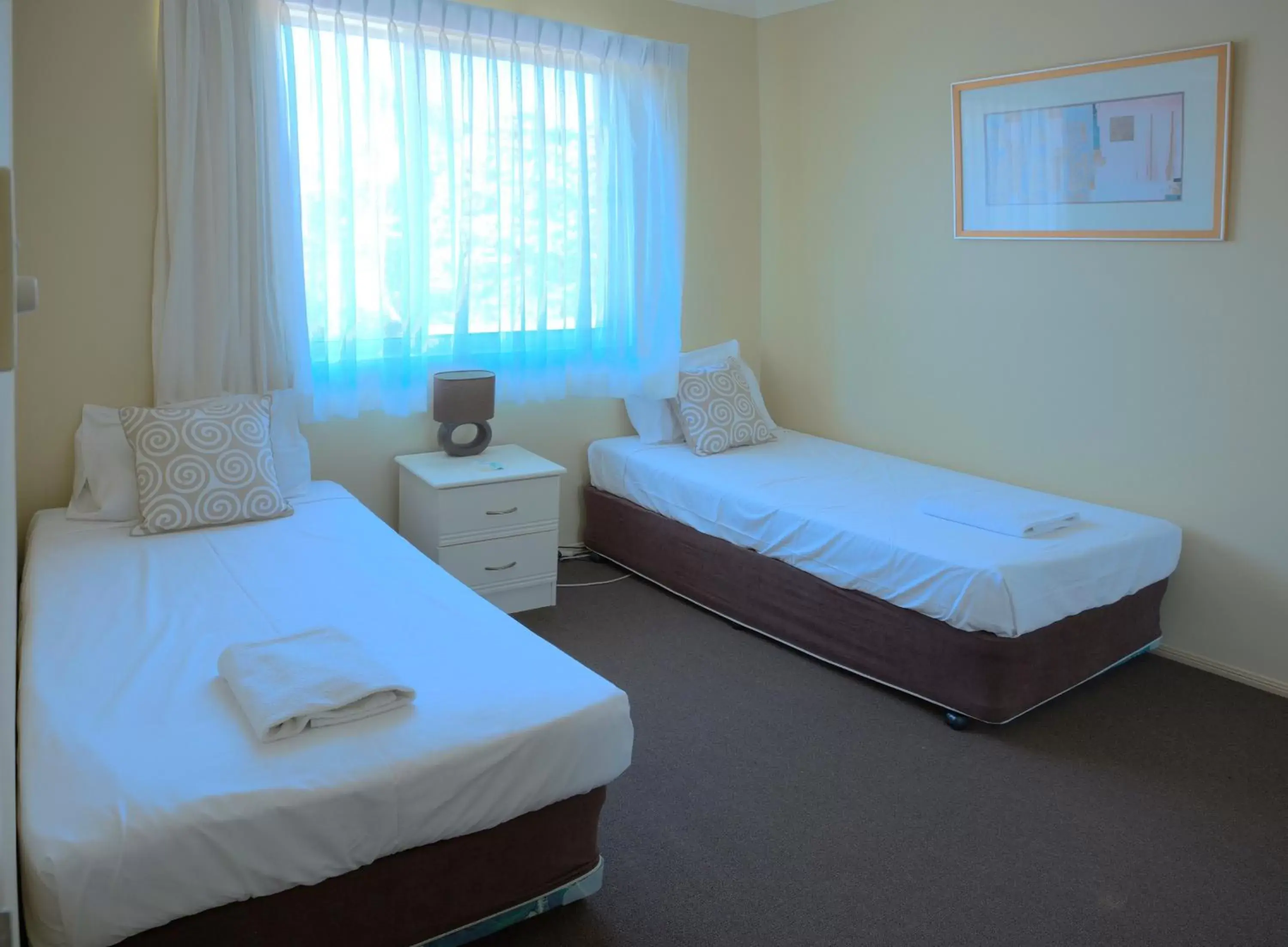 Bed in Bila Vista Holiday Apartments