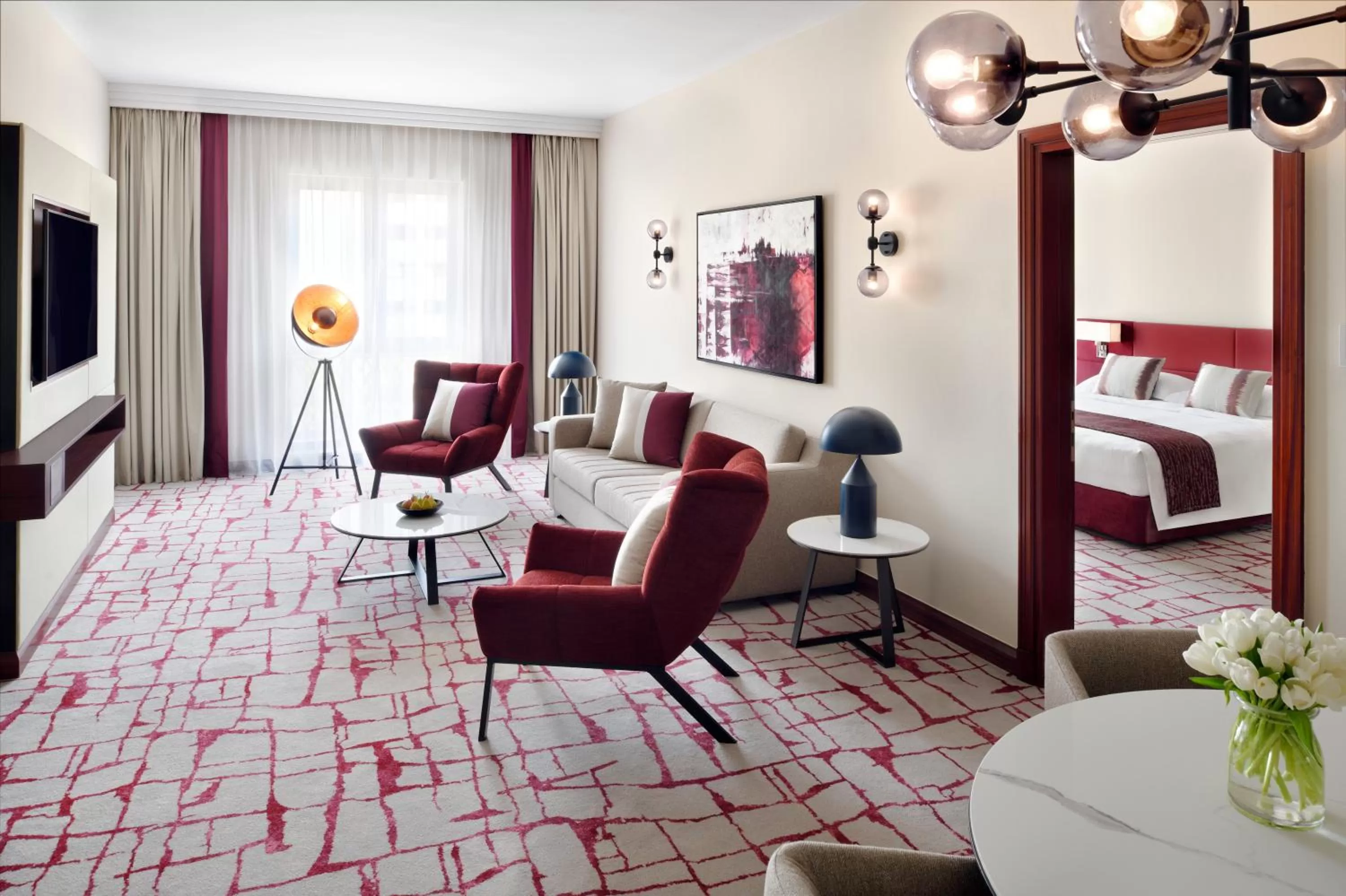 Living room, Bed in Mövenpick Hotel & Apartments Bur Dubai