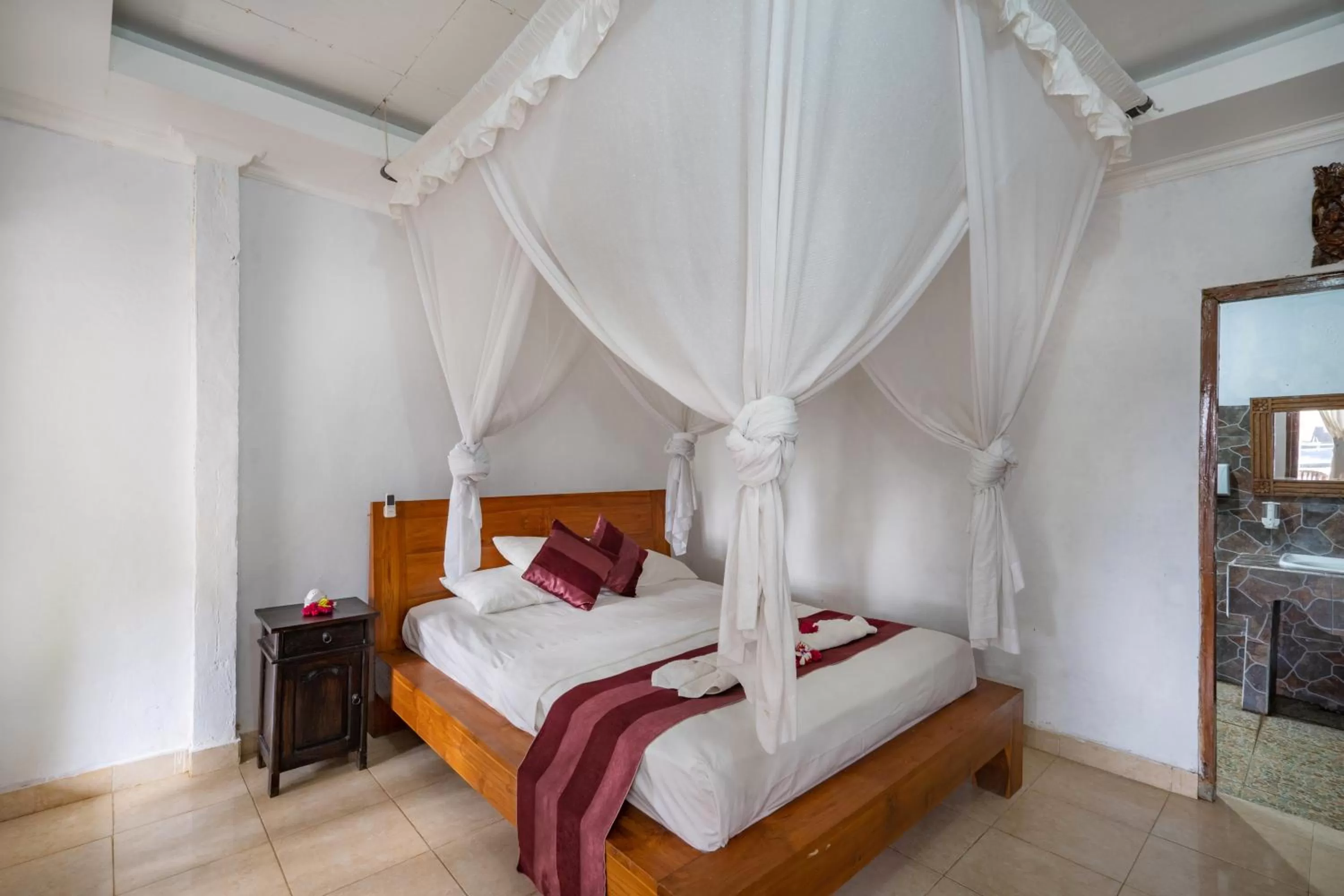 Bed in Mushroom Beach Bungalows