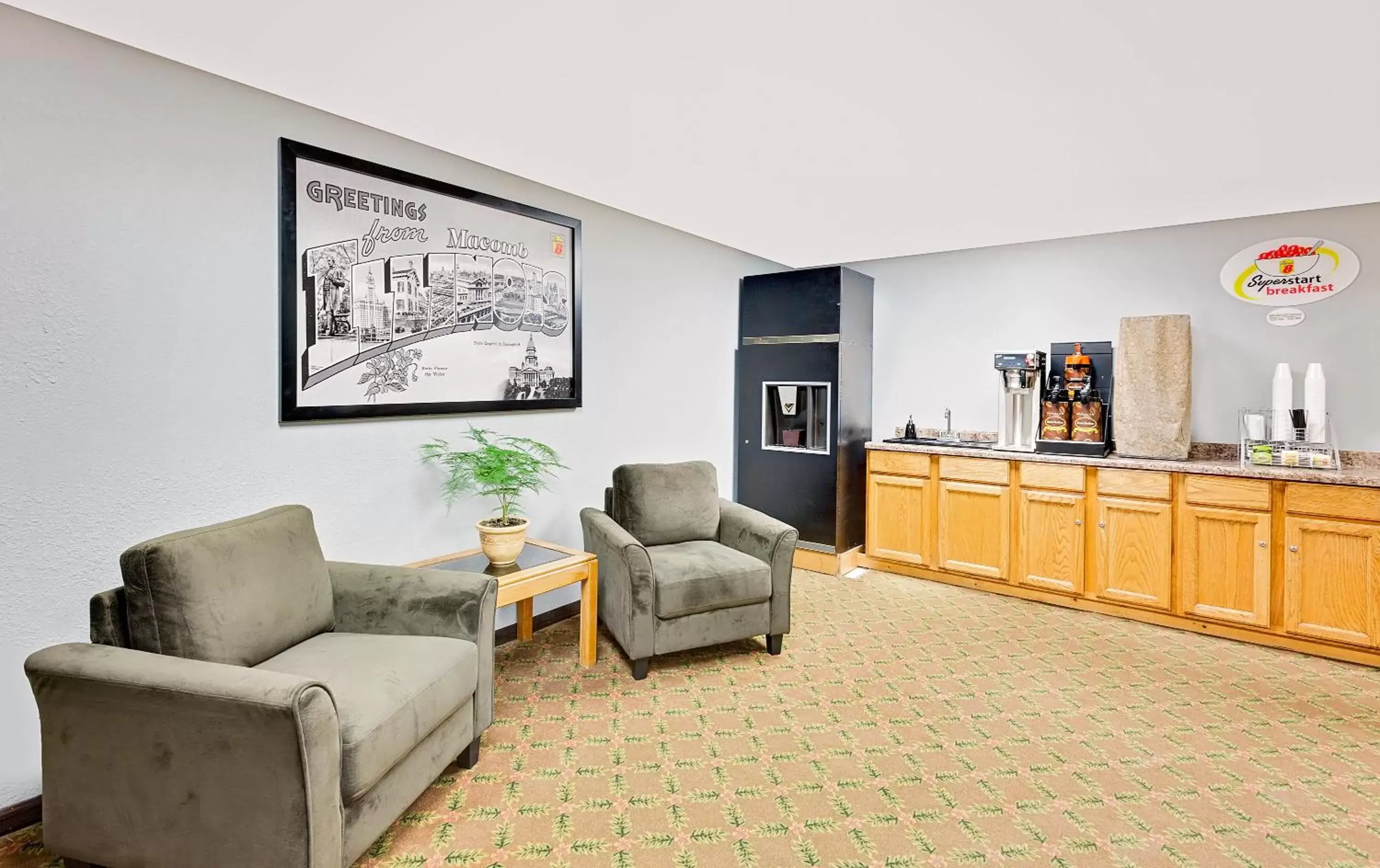Lobby or reception in Super 8 by Wyndham Macomb Lobby or reception in Super 8 by Wyndham Macomb