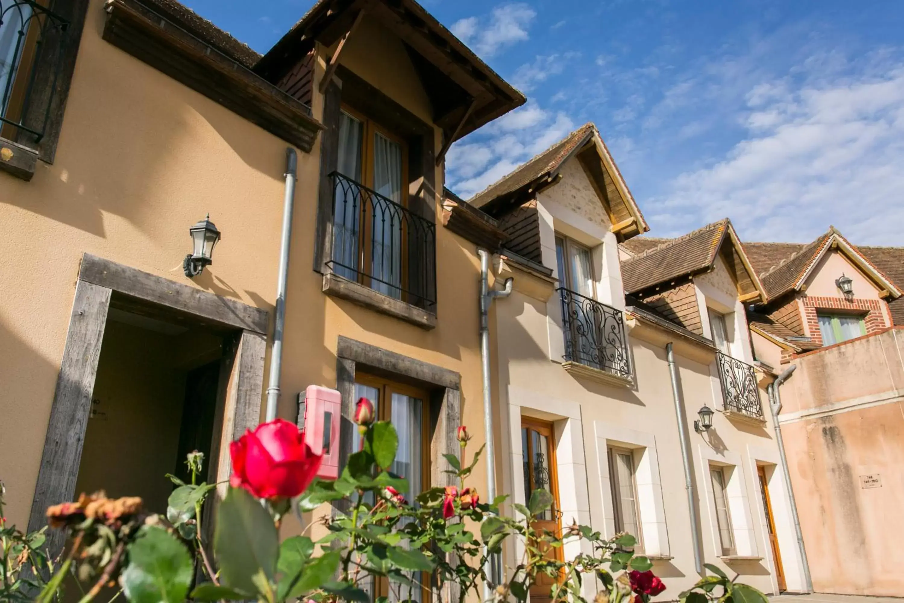 Patio, Property Building in Hôtel Résidence Normandy Country Club by Popinns