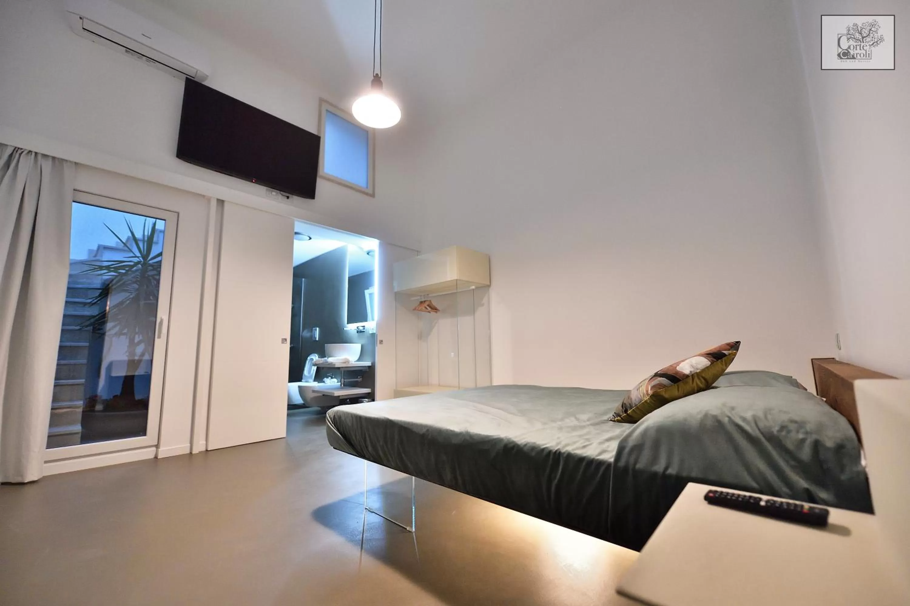 Bed in Corte Cairoli B&B and Suites