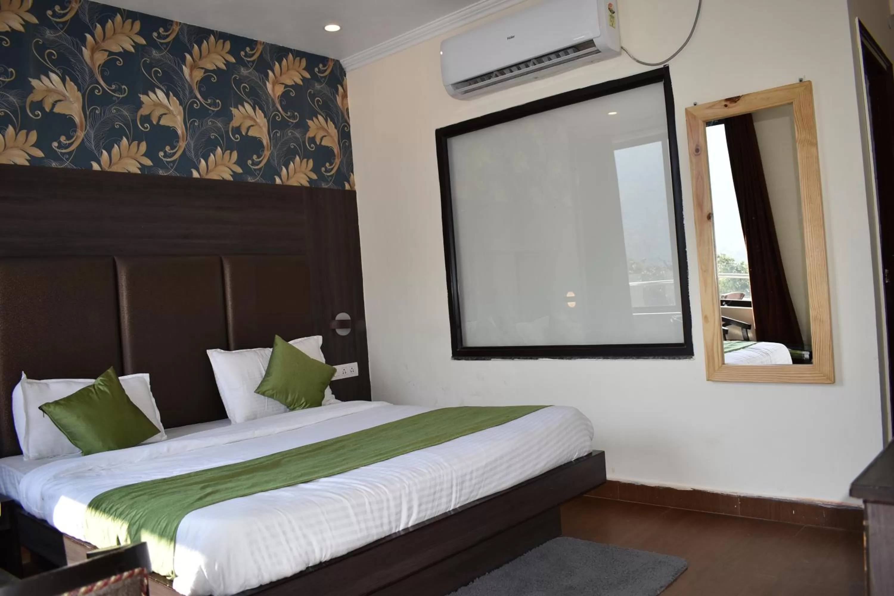 Bedroom, Bed in Tapasthali by Meera Hotels