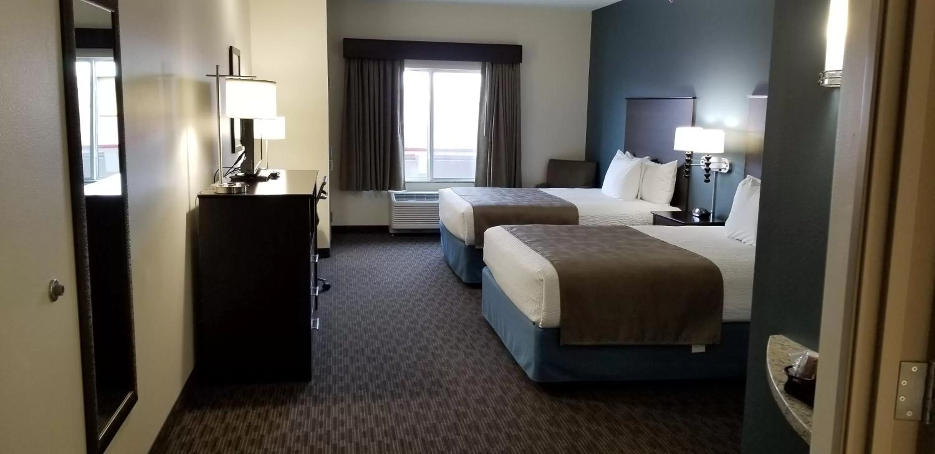 Photo of the whole room, Bed in AmericInn by Wyndham Sioux Falls North