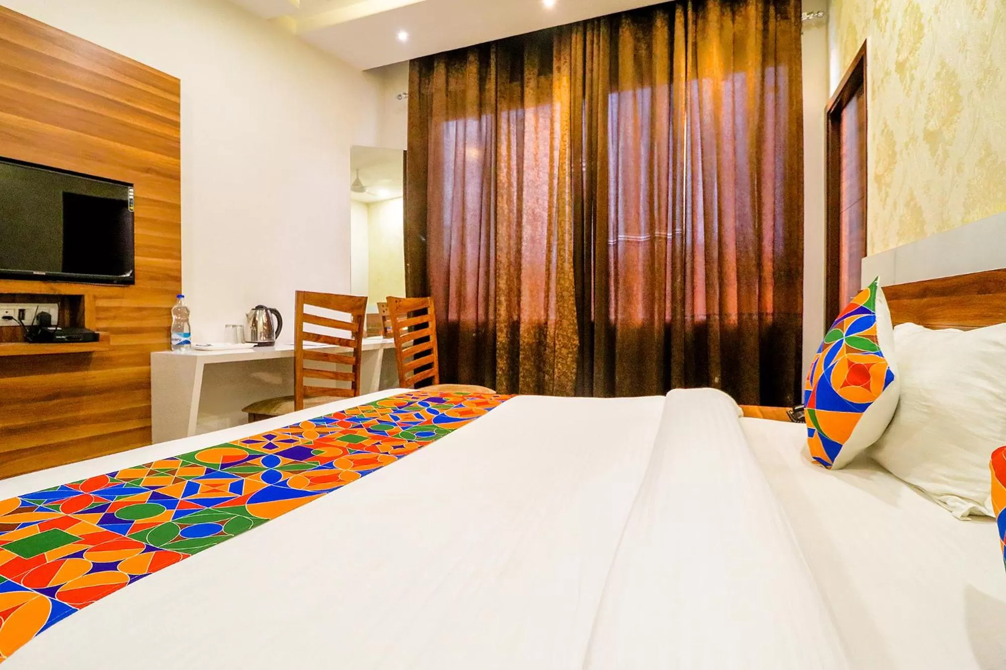 Bed in FabHotel Golden Velvet