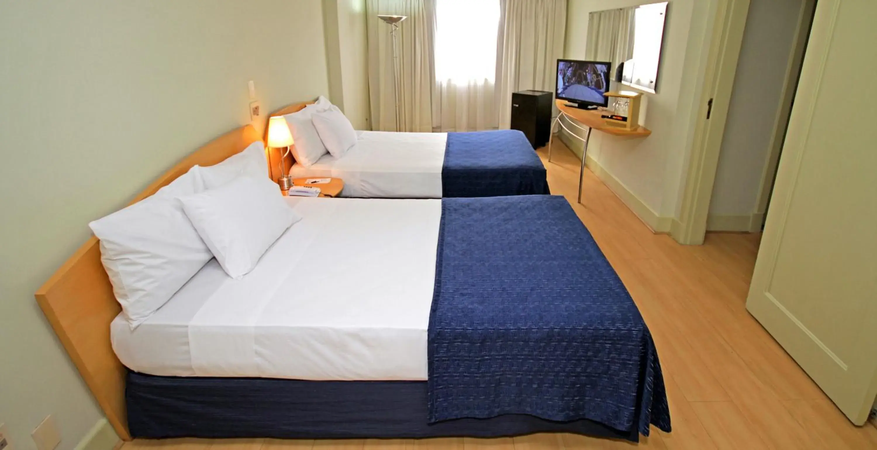 Bed in San Raphael Hotel