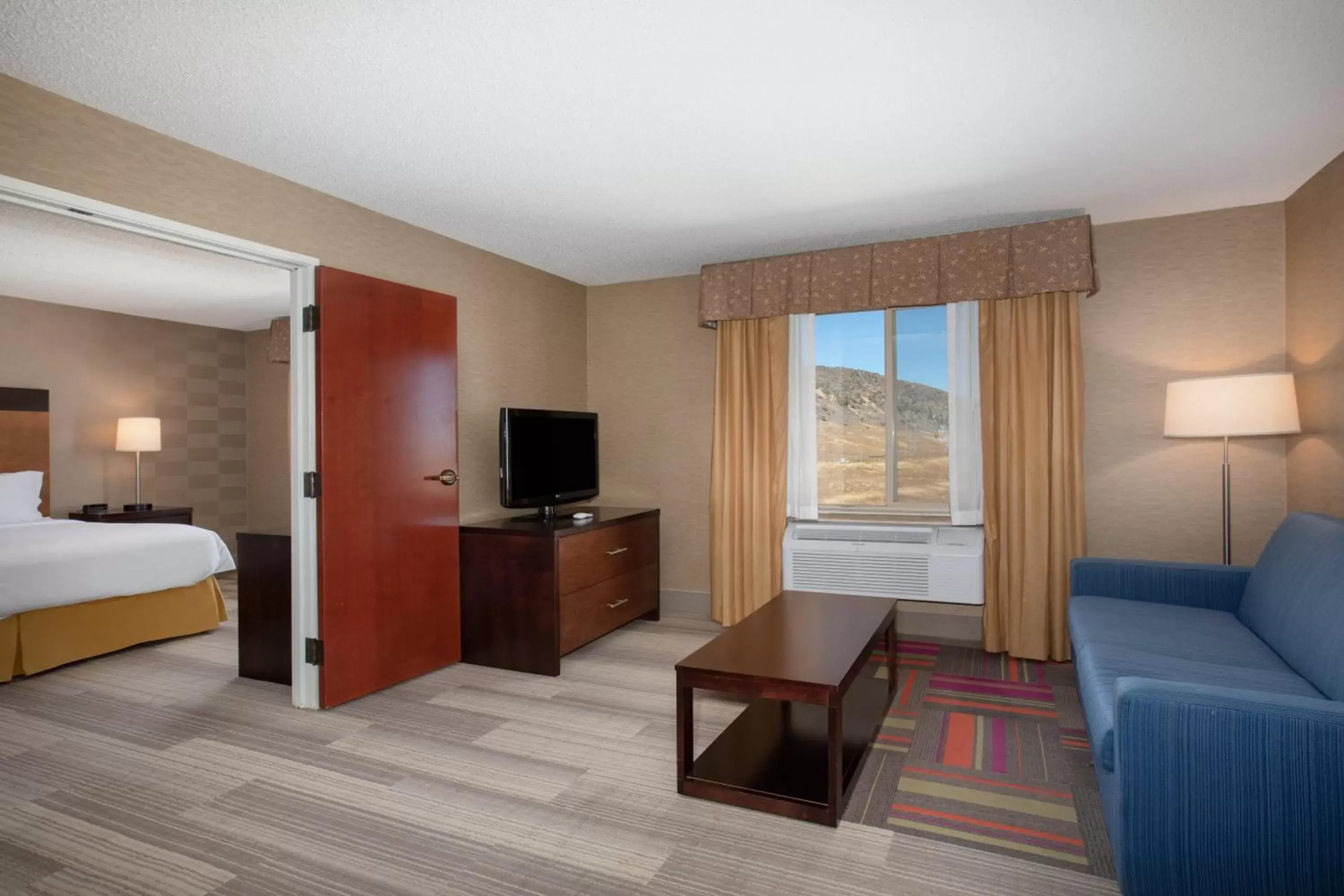 Photo of the whole room, TV/Entertainment Center in Holiday Inn Express Hotel & Suites Littleton, an IHG Hotel