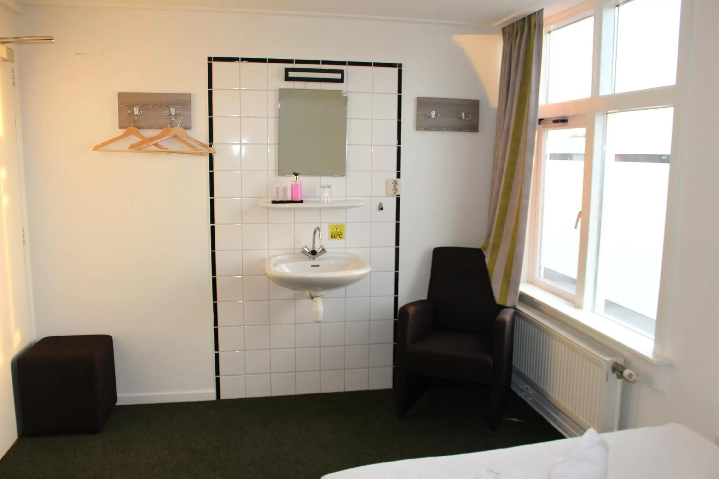 Bathroom in Hotel Fase Fier Eten en Drinken