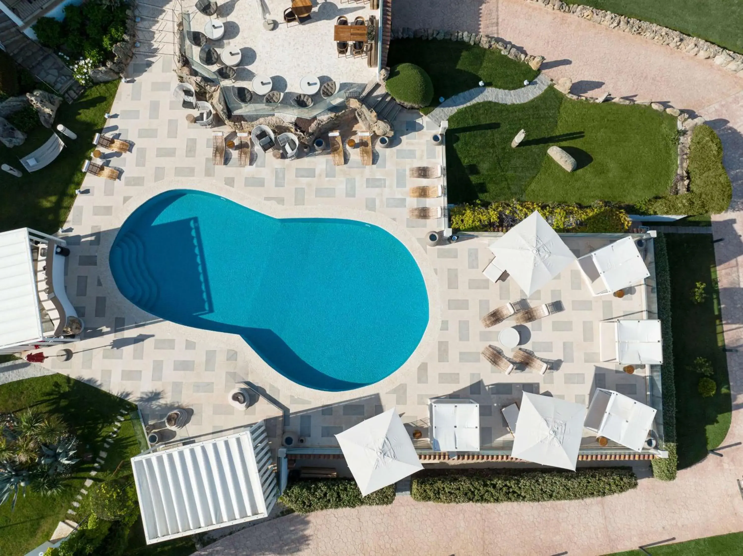 Swimming pool, Pool View in Sulia House Porto Rotondo, Curio Collection by Hilton