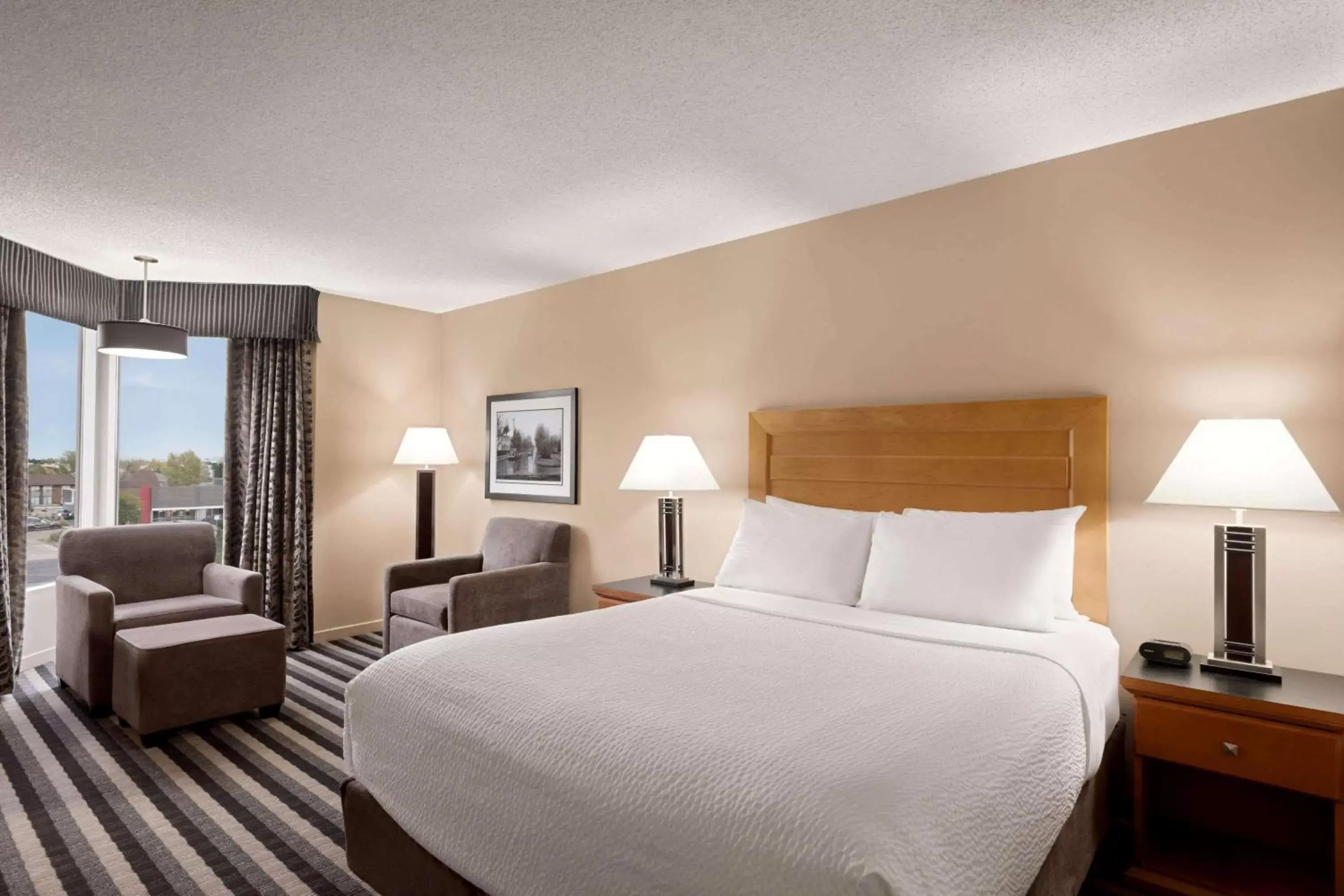 Photo of the whole room, Bed in Royal Hotel West Edmonton, Trademark Collection by Wyndham