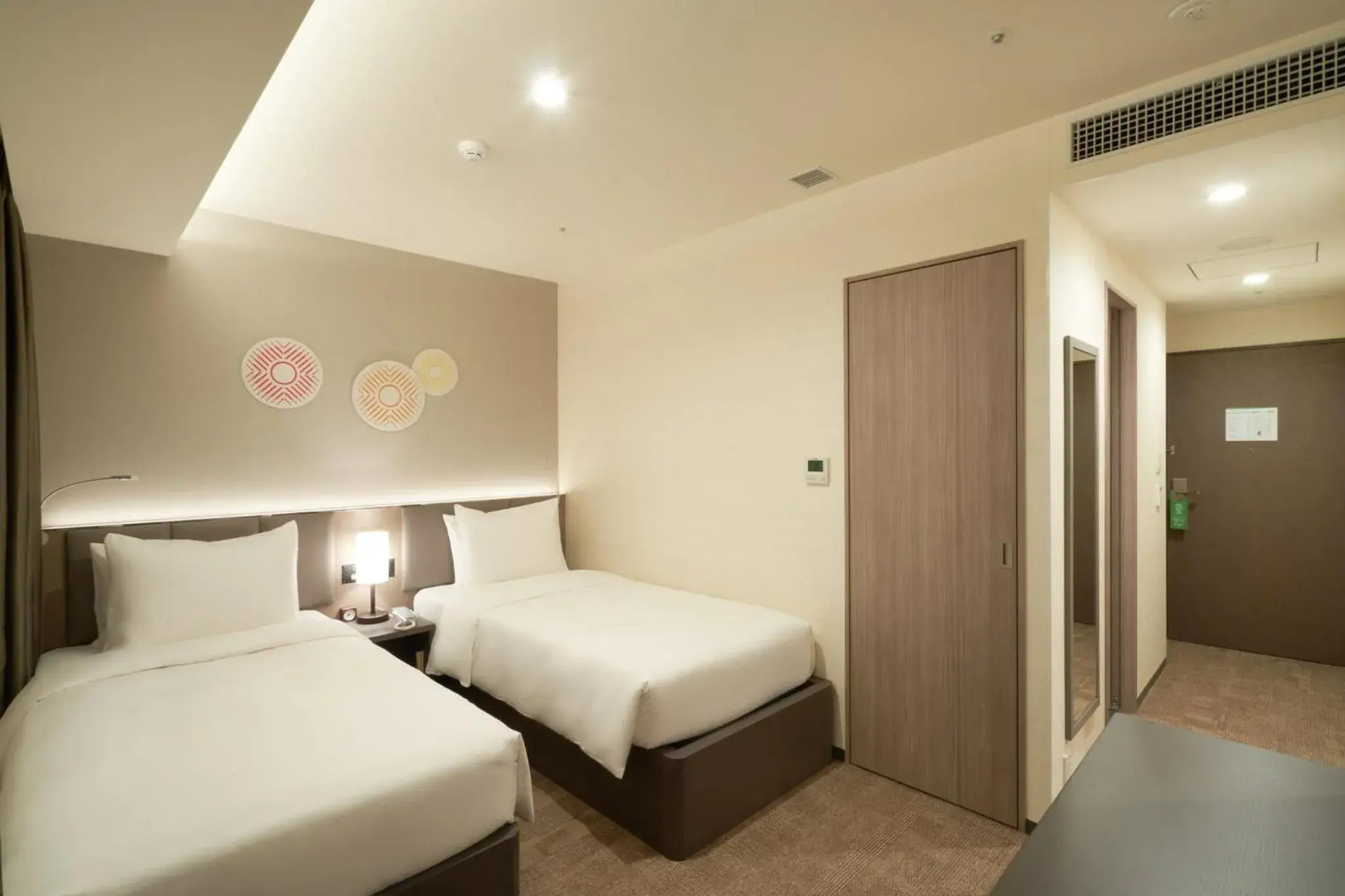 Photo of the whole room, Bed in Holiday Inn & Suites Shin Osaka, an IHG Hotel