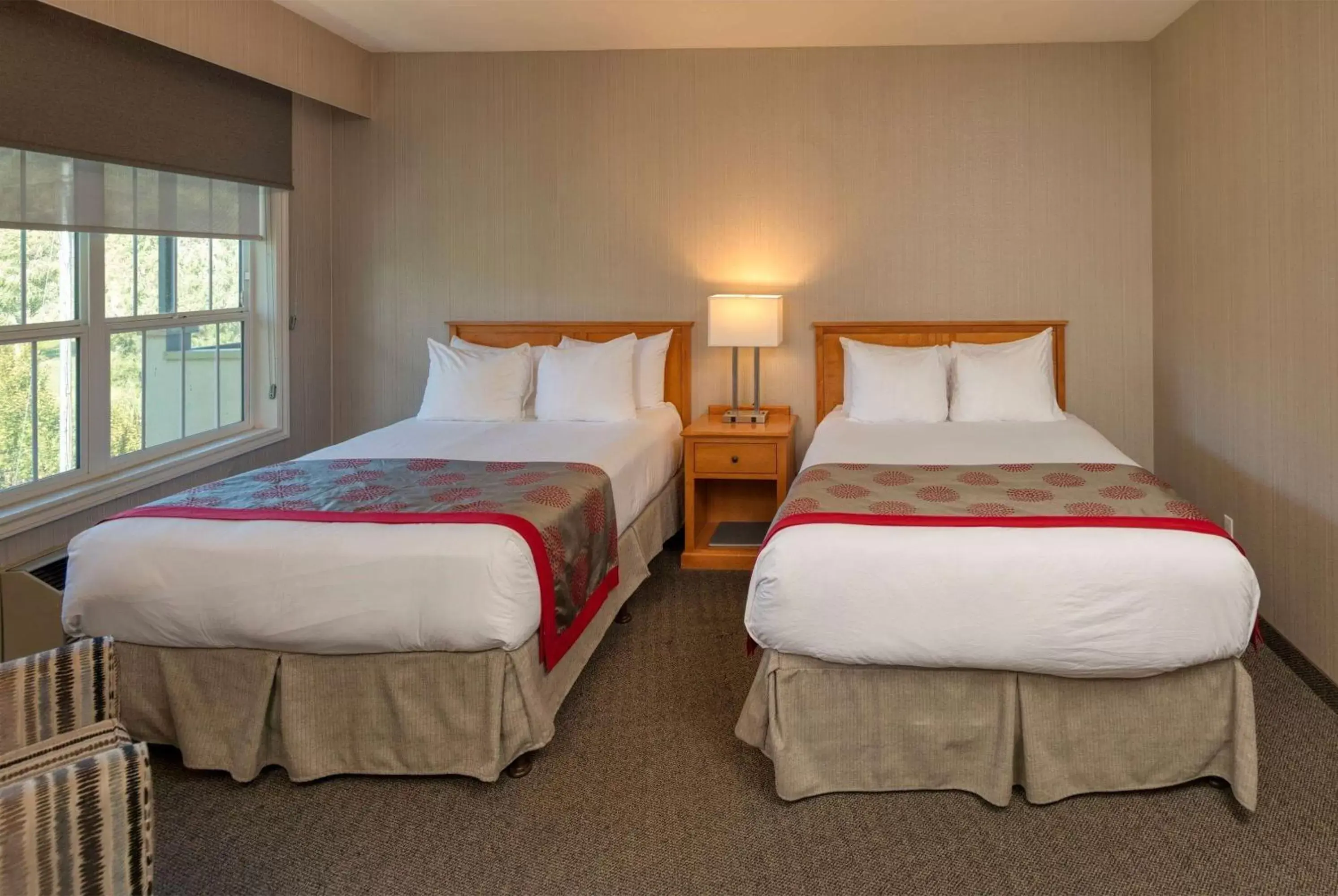 Photo of the whole room, Bed in Ramada by Wyndham Penticton Hotel & Suites