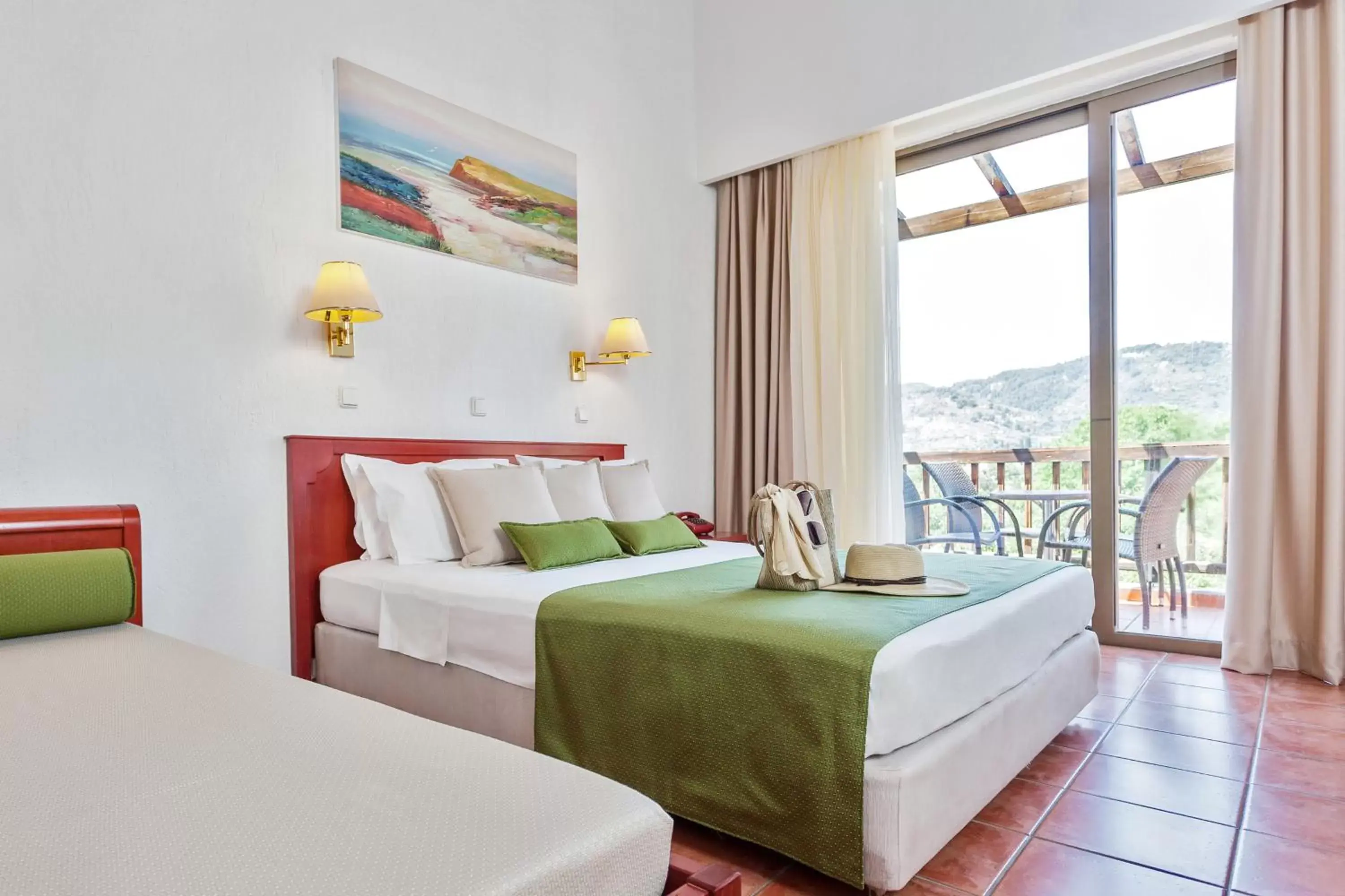 Bed in Rigas Hotel Skopelos