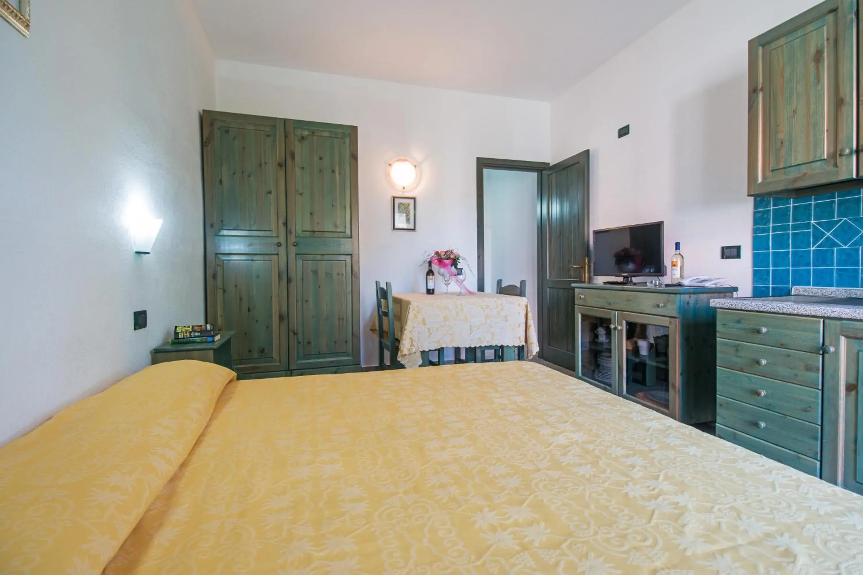 Living room, Kitchen/Kitchenette in Albergo Residenziale Gli Ontani