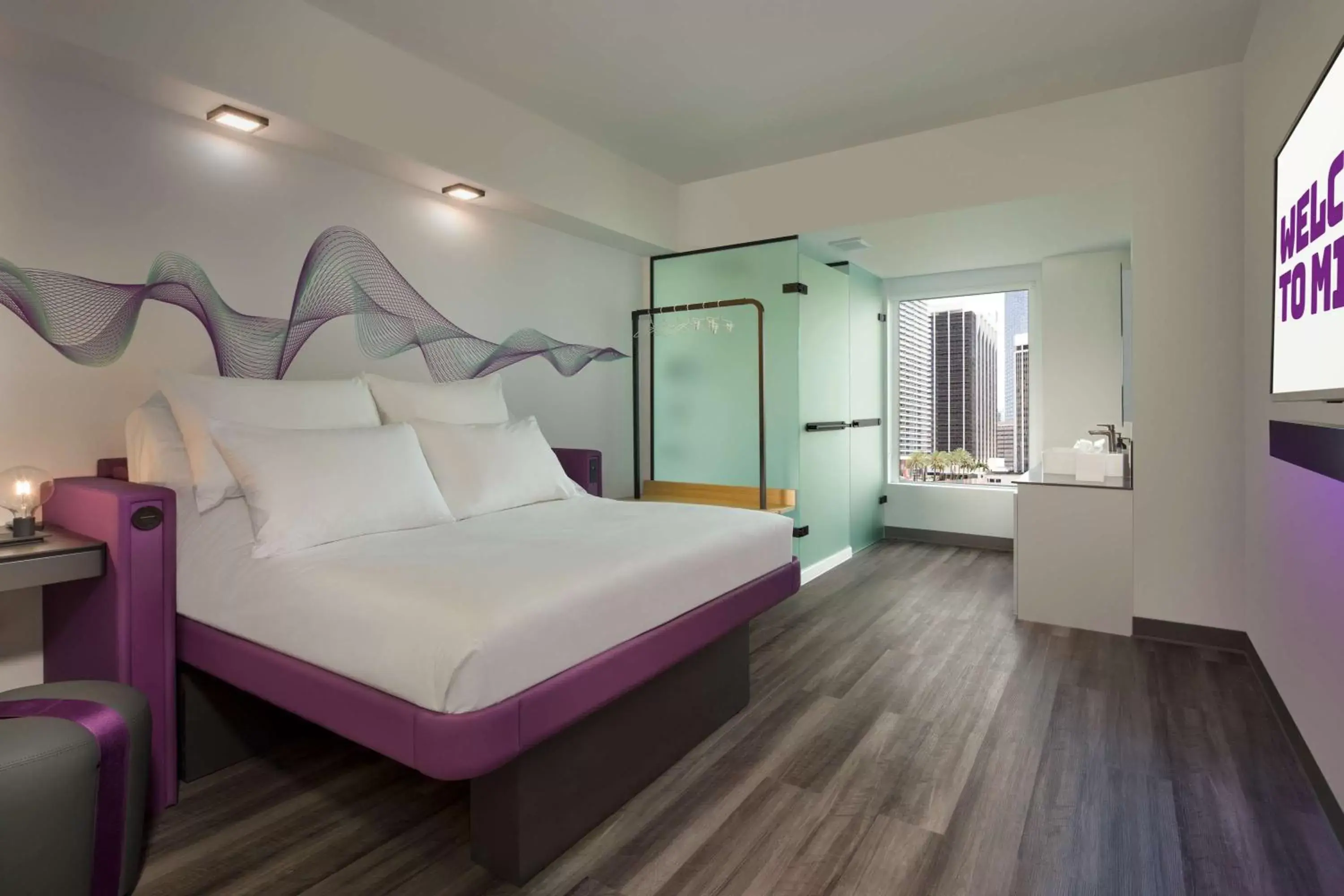 Photo of the whole room, Bed in YOTEL Miami