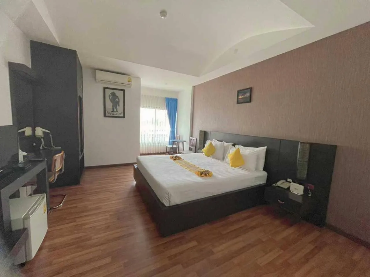 Bed in Jingjit Hotel