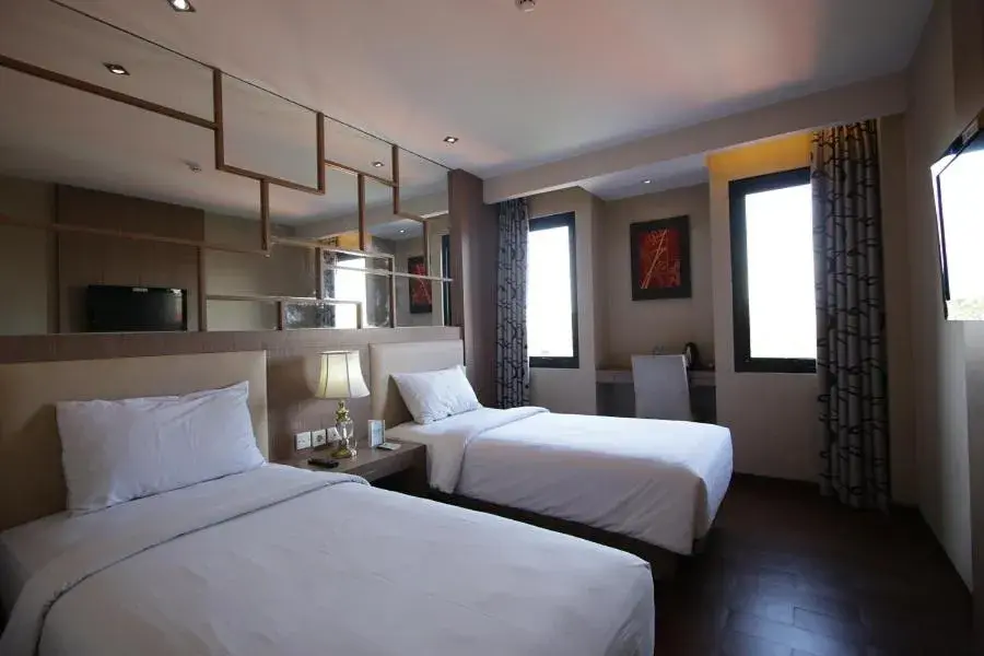 Bed in Serela Kuta by KAGUM Hotels