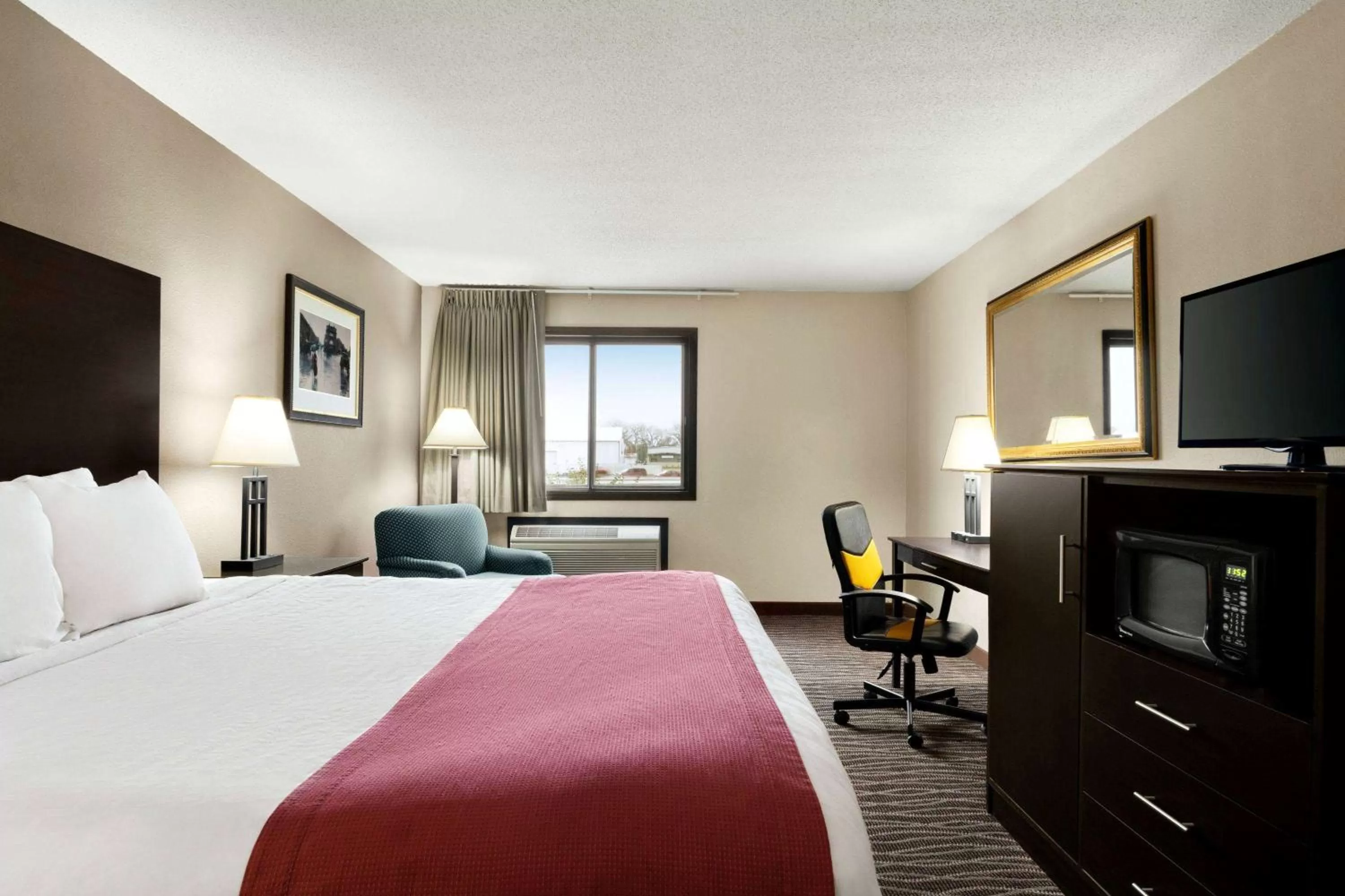 Photo of the whole room, Bed in Baymont by Wyndham Sioux Falls North,I-29,Russell St, Airport