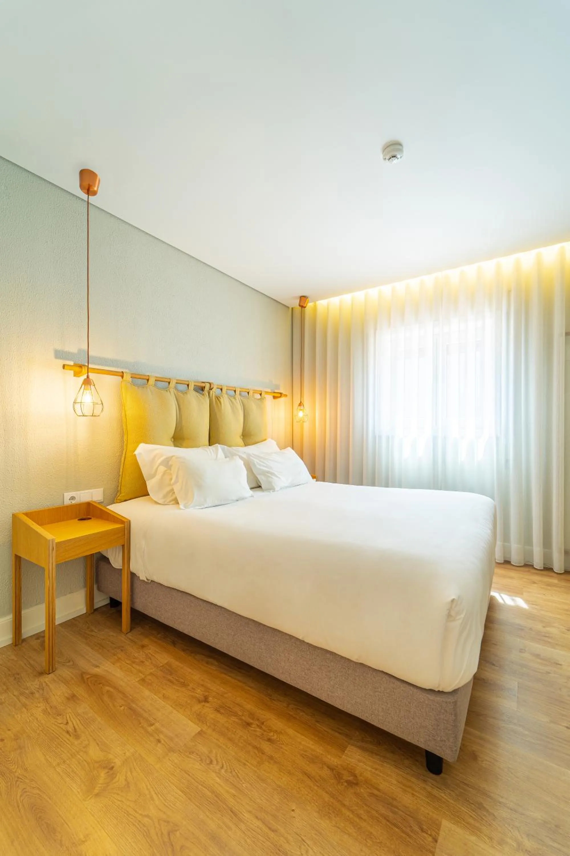 Bed in The Rex Hotel Porto