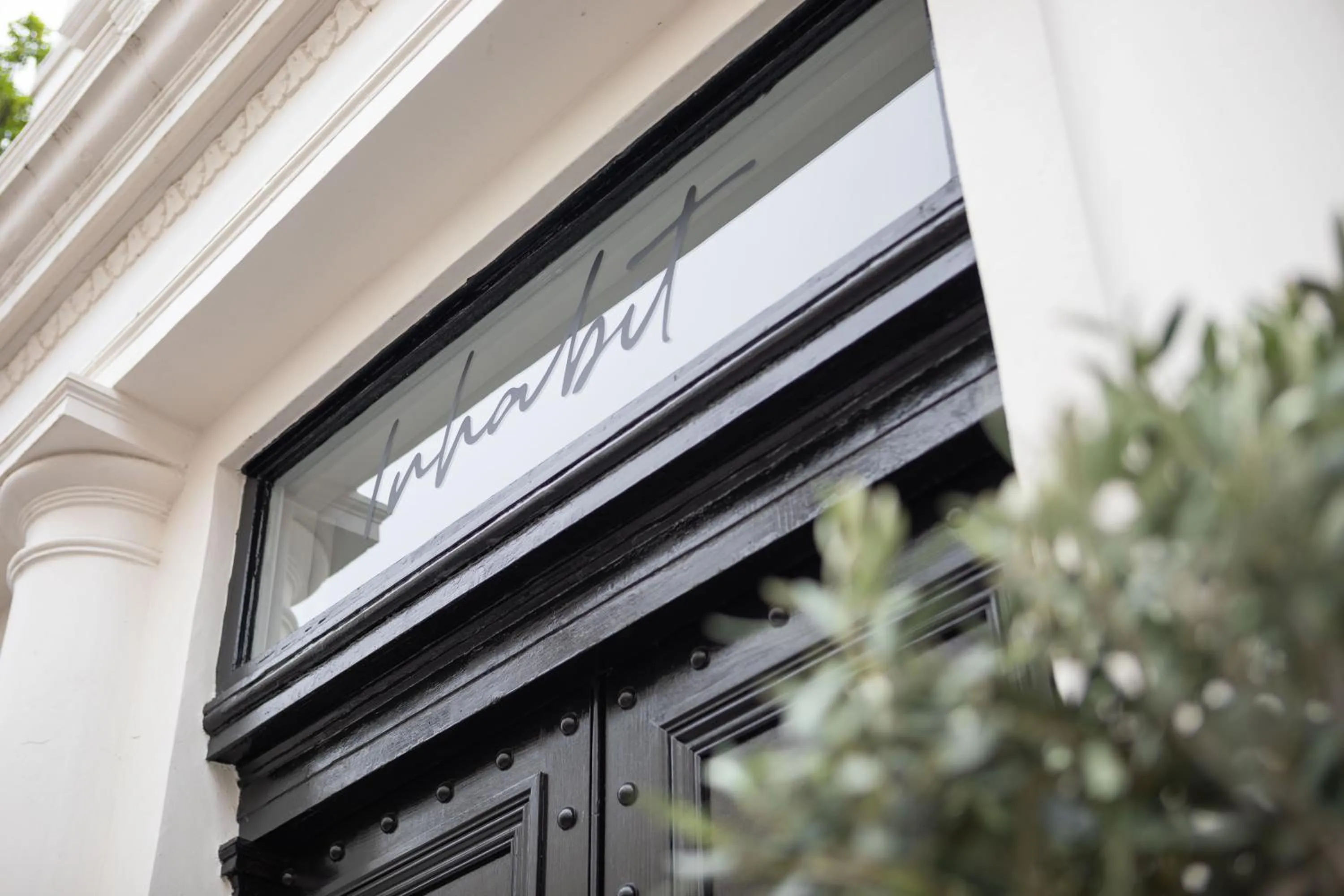 Property logo or sign in Inhabit Queen's Gardens, a Member of Design Hotels