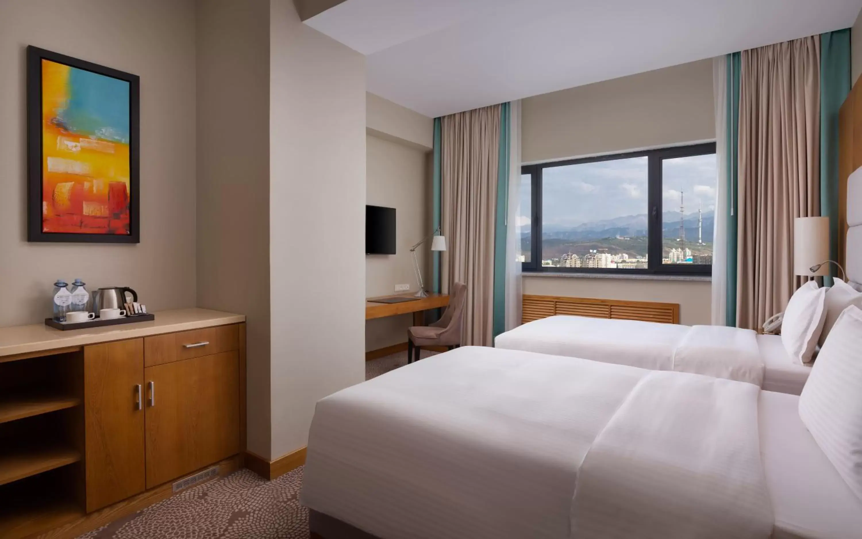 Bed, Mountain View in DoubleTree by Hilton Almaty