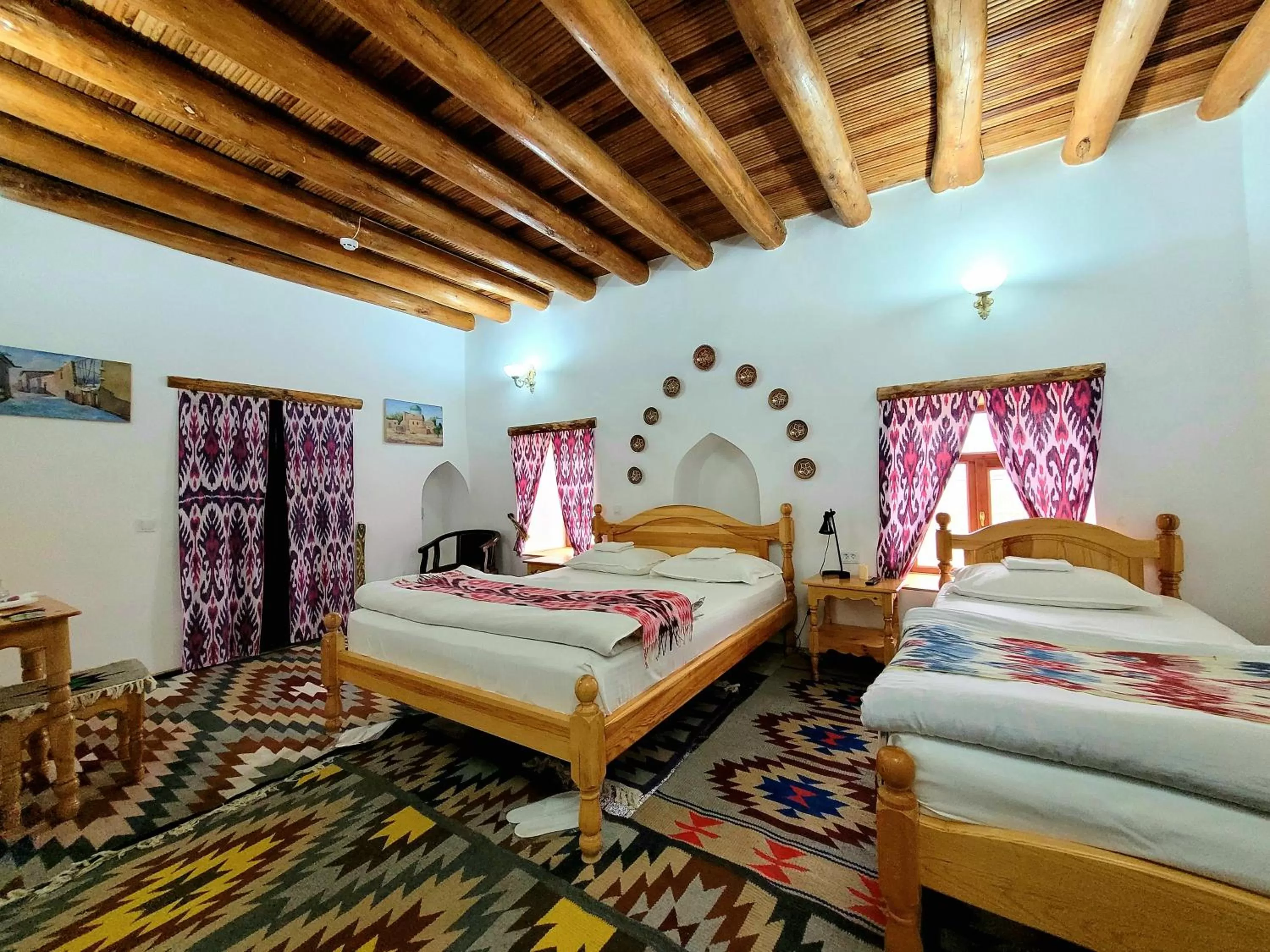 Bed in madrasah Polvon-Qori boutique hotel XIX century