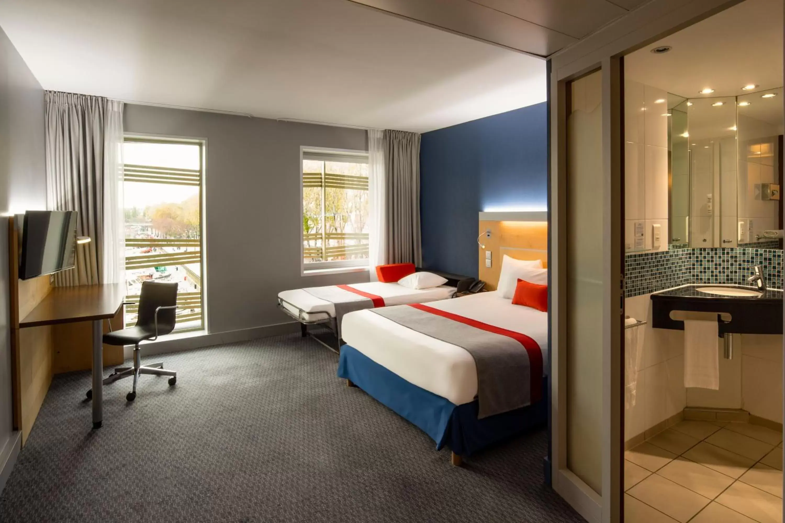 Photo of the whole room in Holiday Inn Express Paris-Canal De La Villette, an IHG Hotel