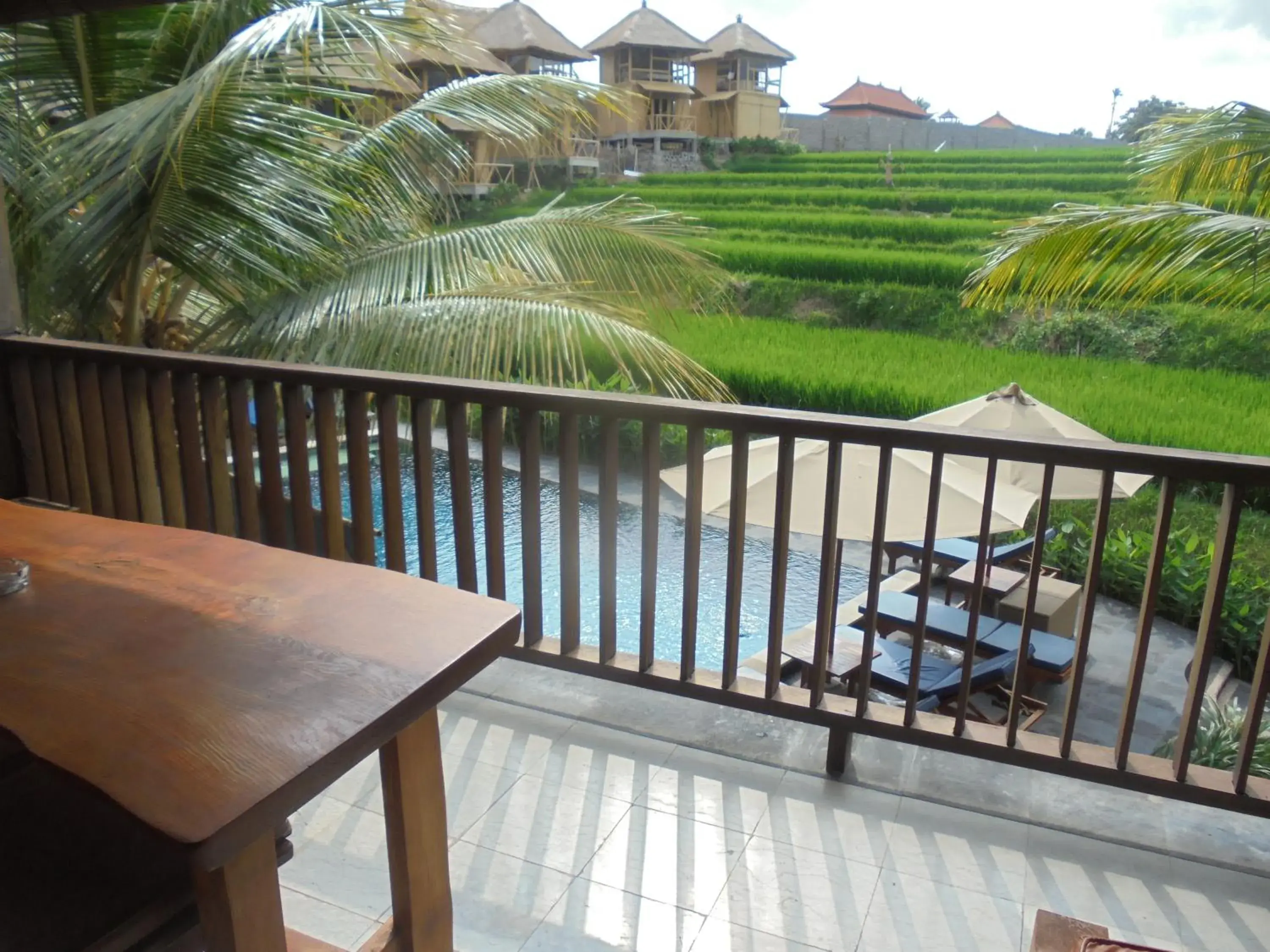 Balcony/Terrace, Pool View in Biyukukung Suite & Spa