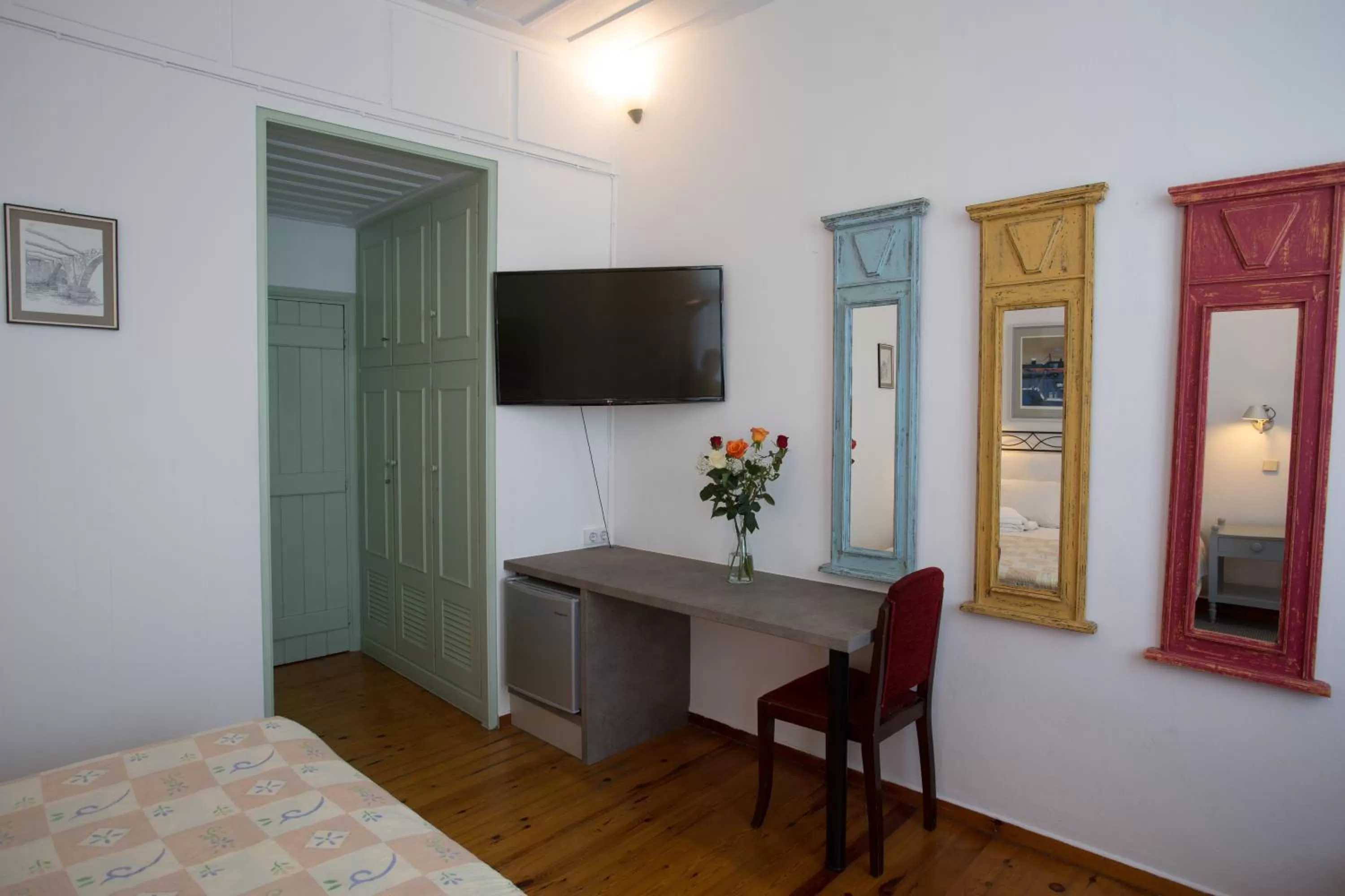 Seating area, Bed in Nostos Hotel