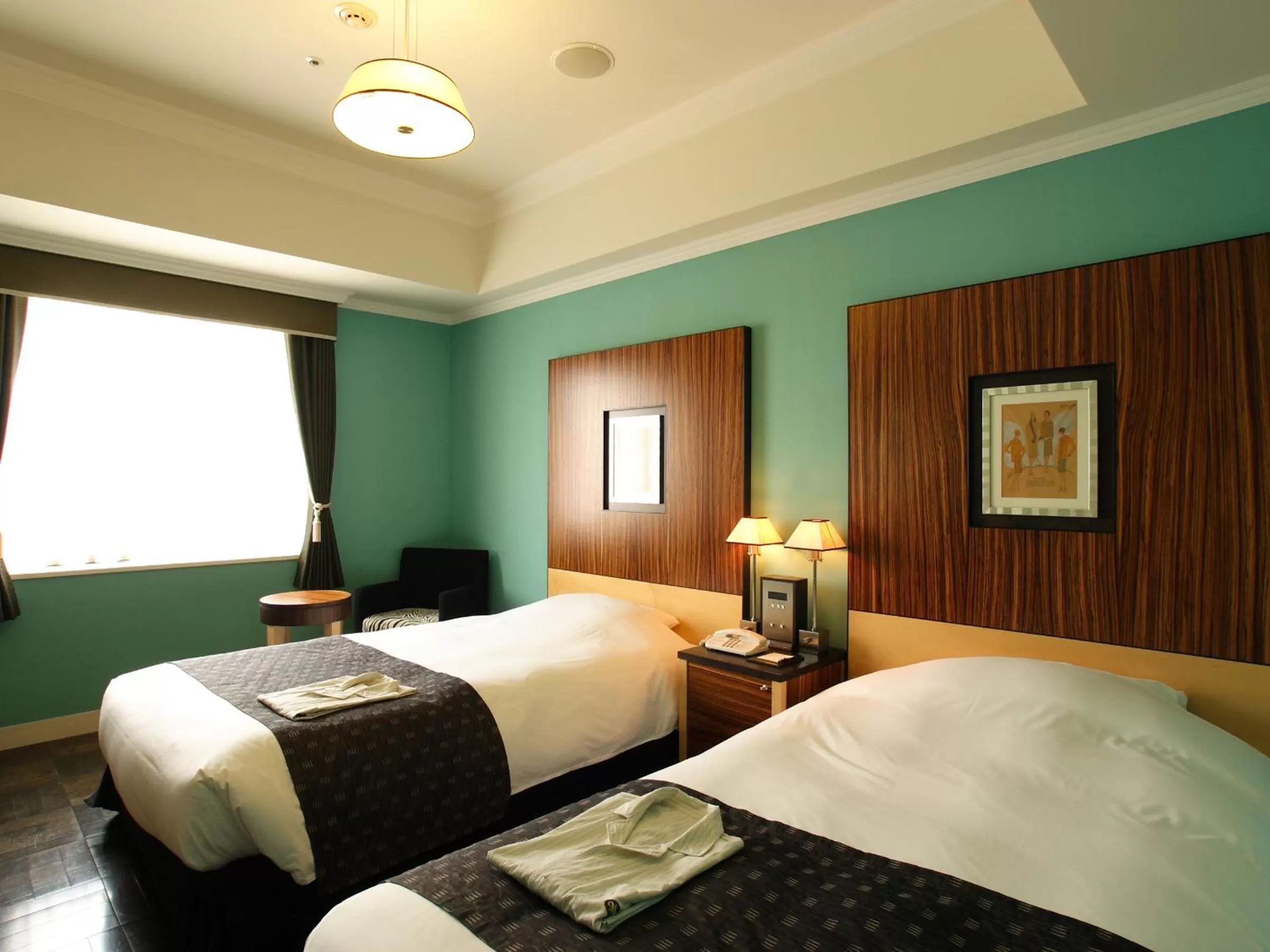 Photo of the whole room, Bed in Hotel Monterey La Soeur Fukuoka