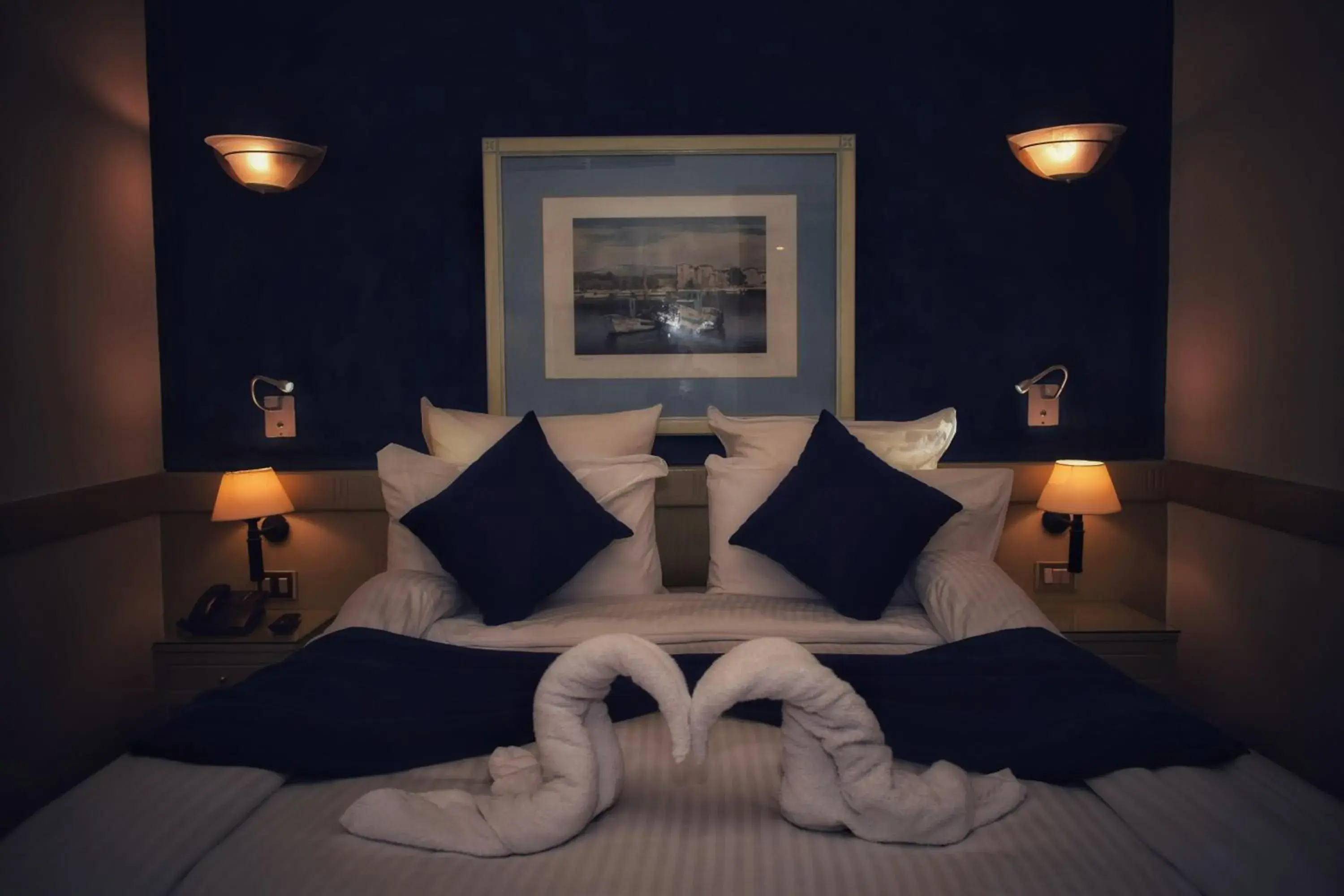 Bed in Romance Alexandria Hotel