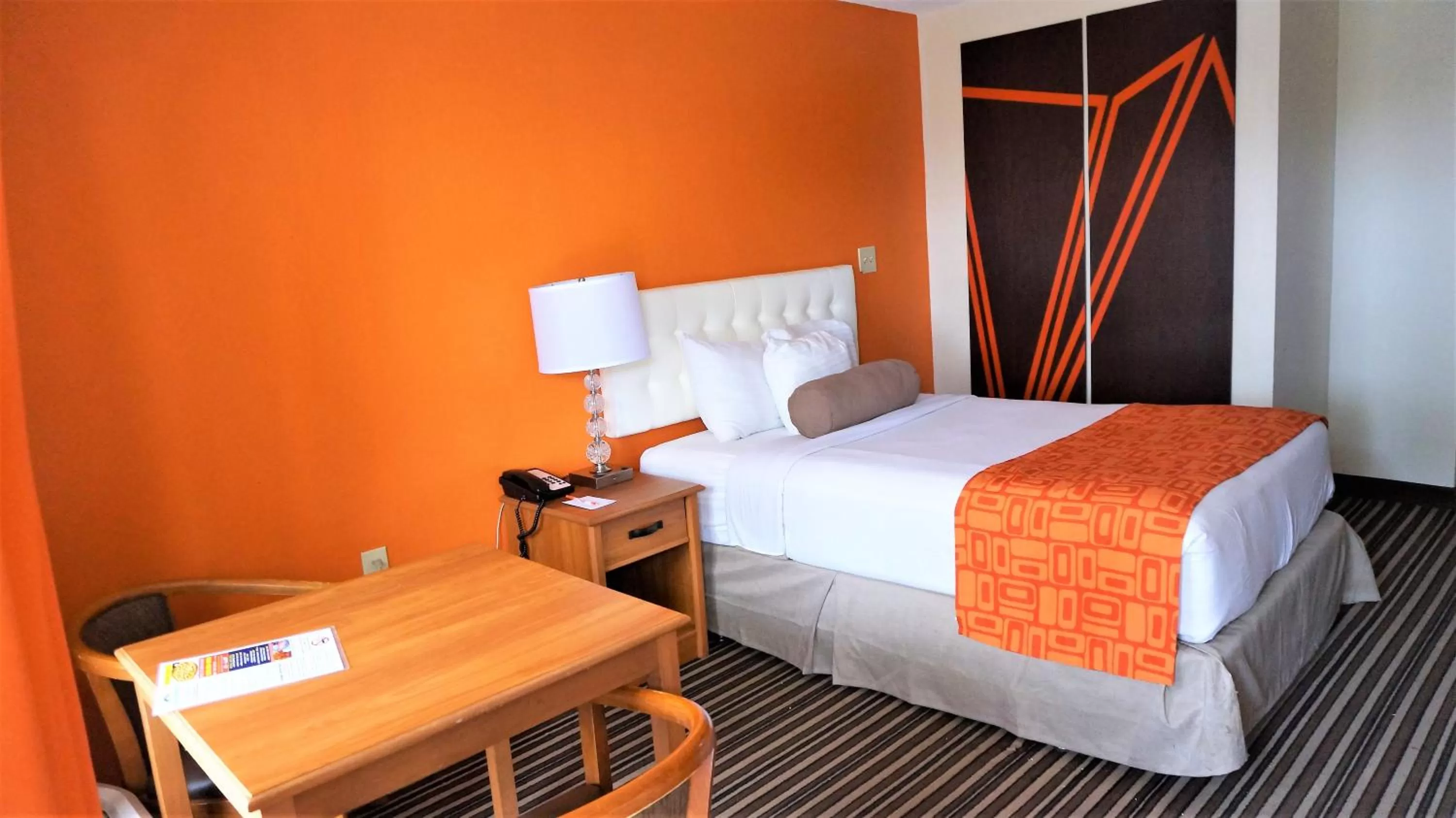 Bed in Howard Johnson by Wyndham Greensboro Near the Coliseum