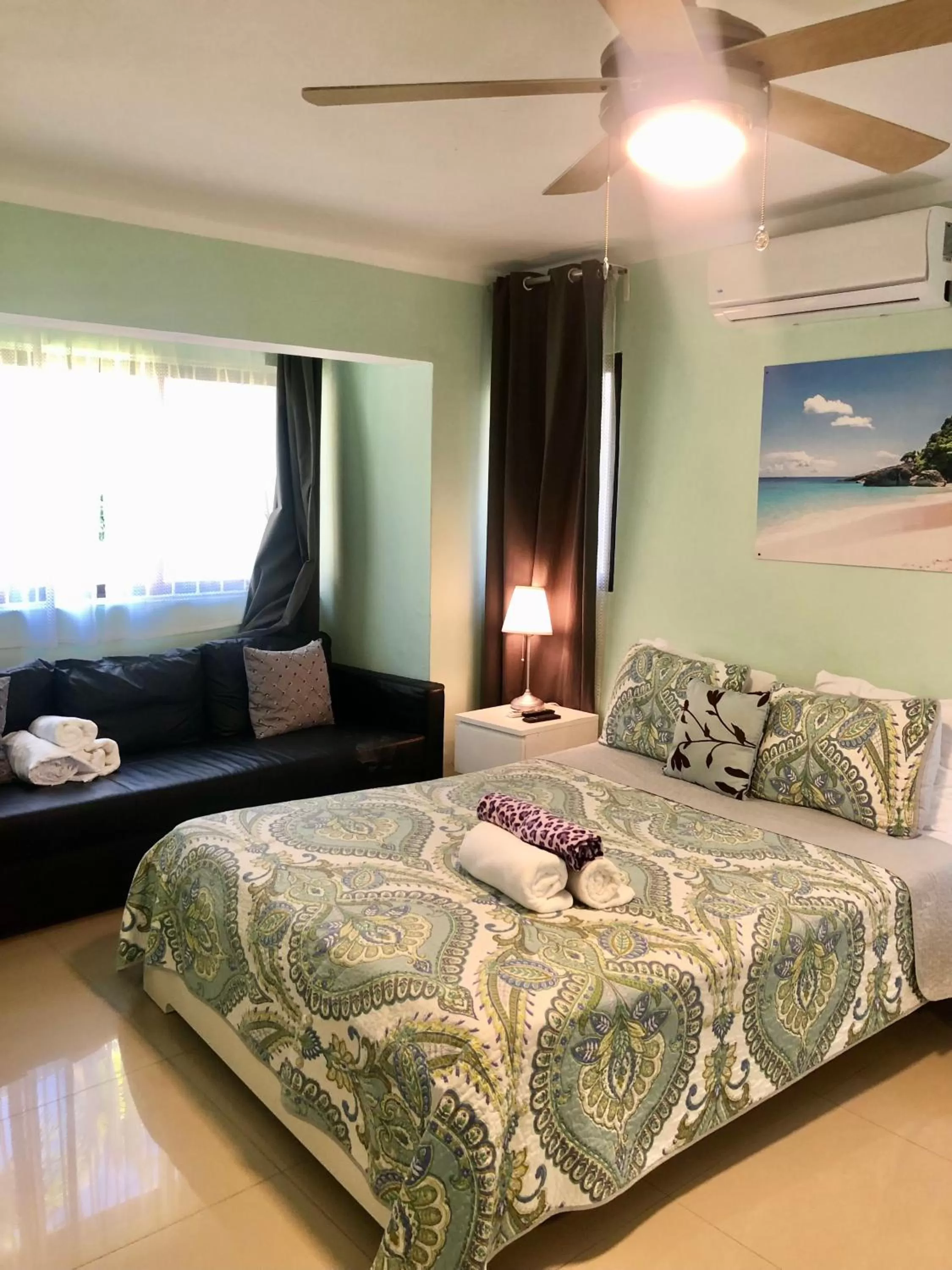 Bed in Los Corales Luxury Villas Beach Club and Spa