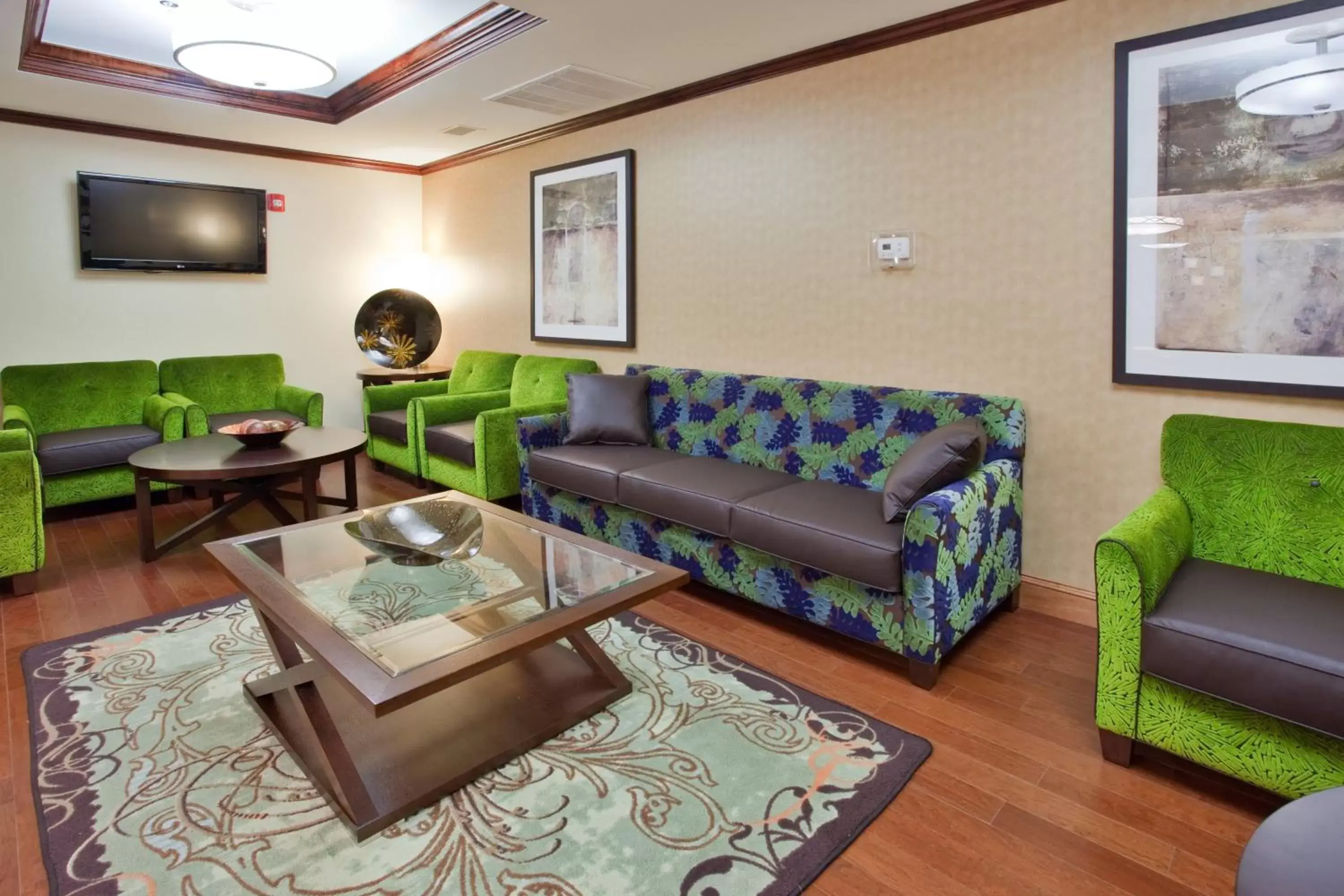 Property building, Seating Area in Holiday Inn Express Hotel & Suites Fredericksburg, an IHG Hotel