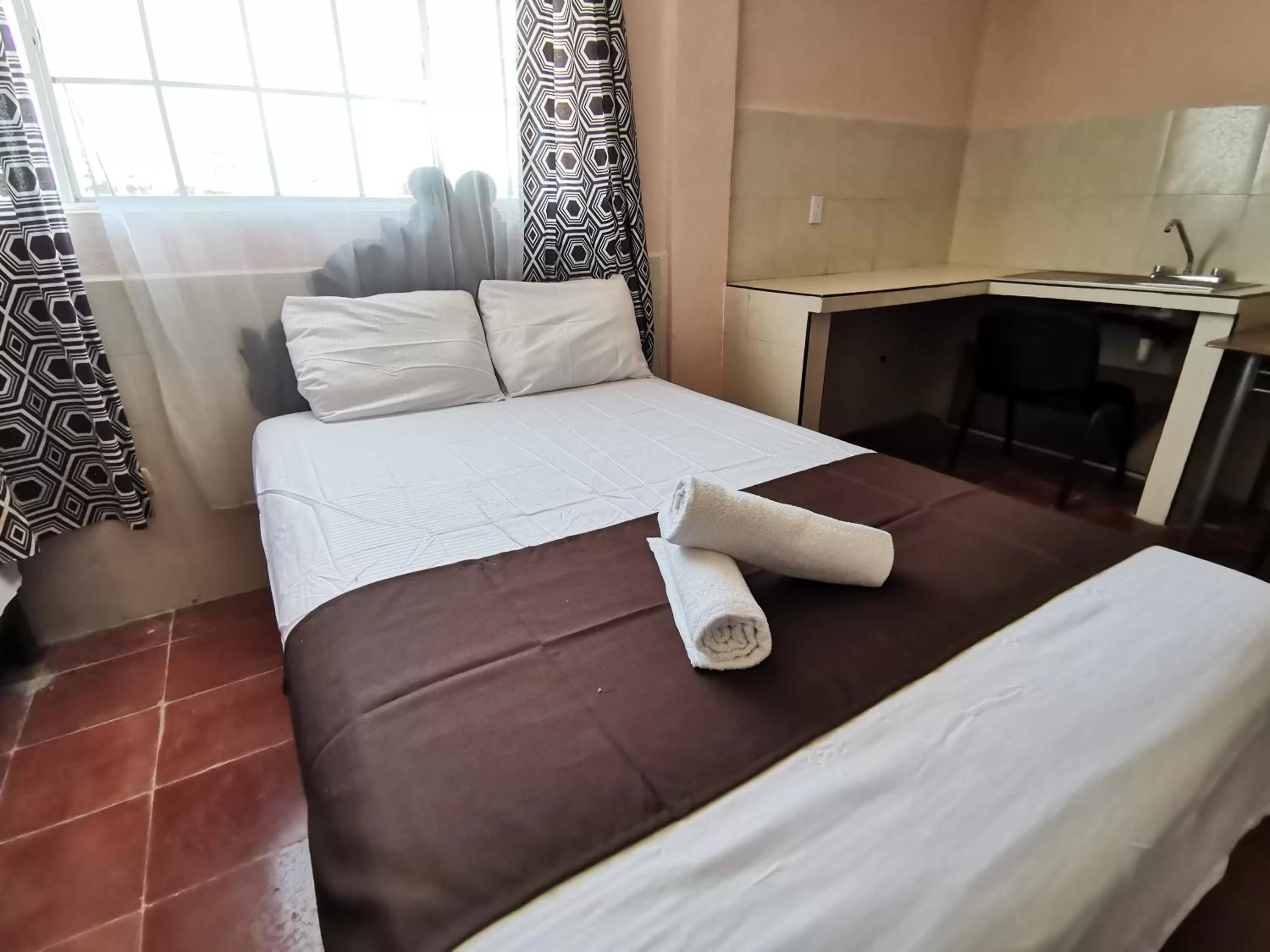 Bed in Hotel Colonial San Carlos