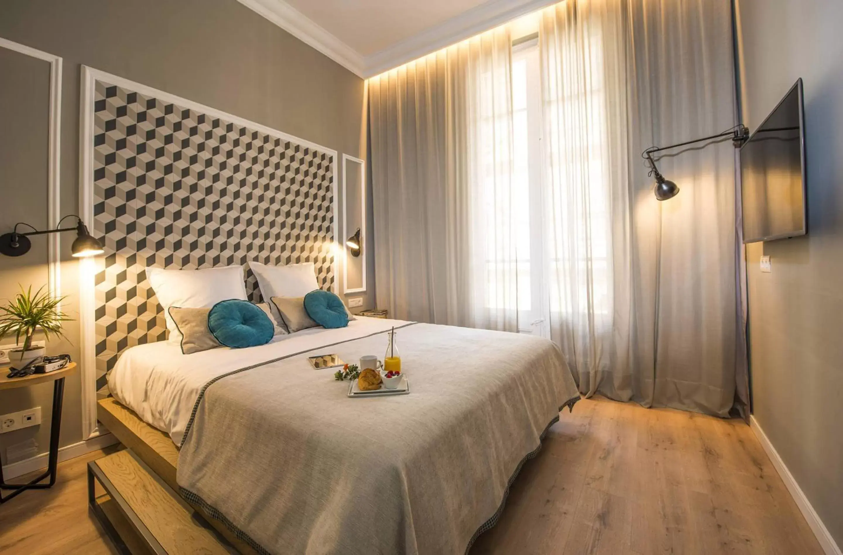 Bed in Mosaic Barcelona by Ona