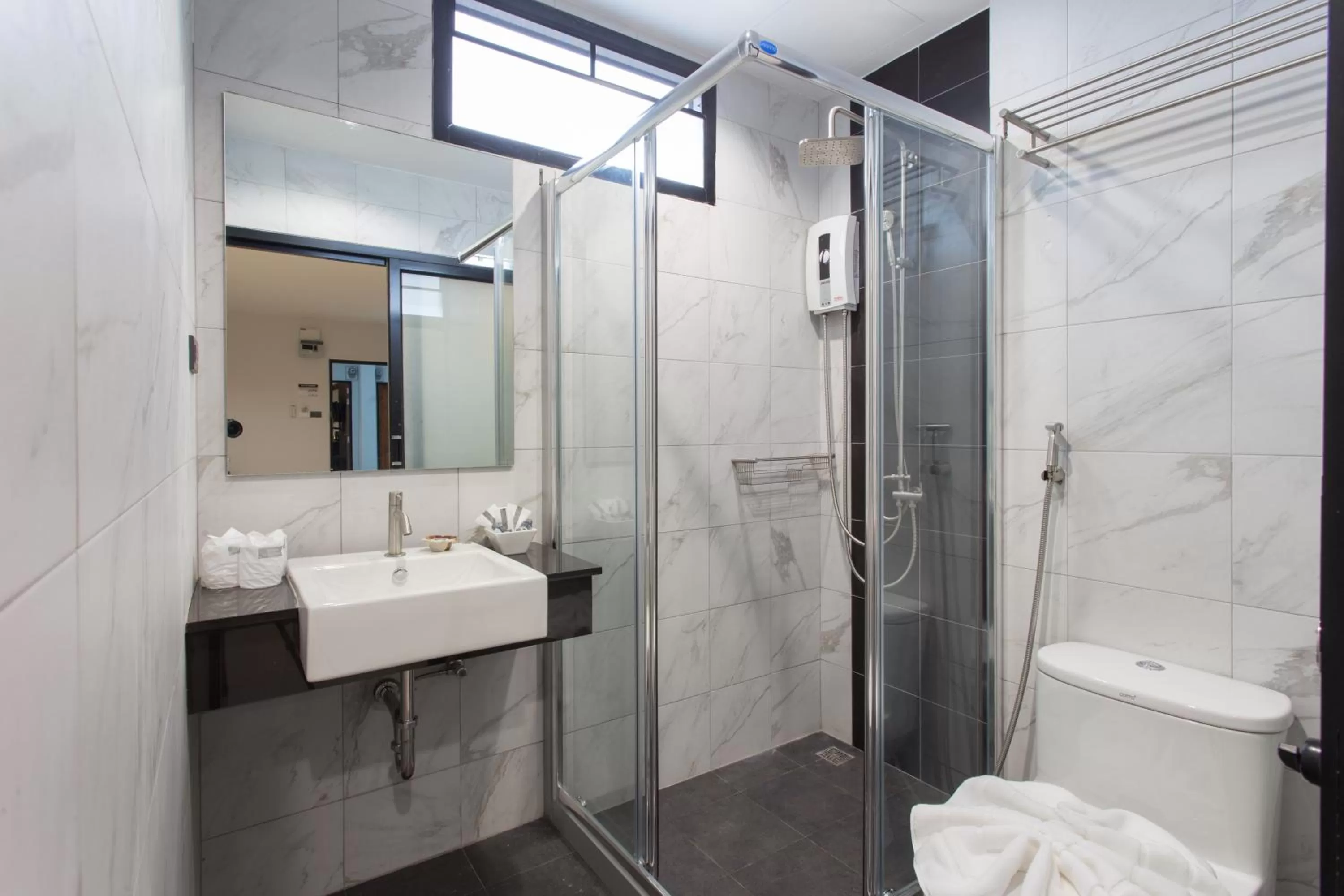 Shower in Well Timed Hotel