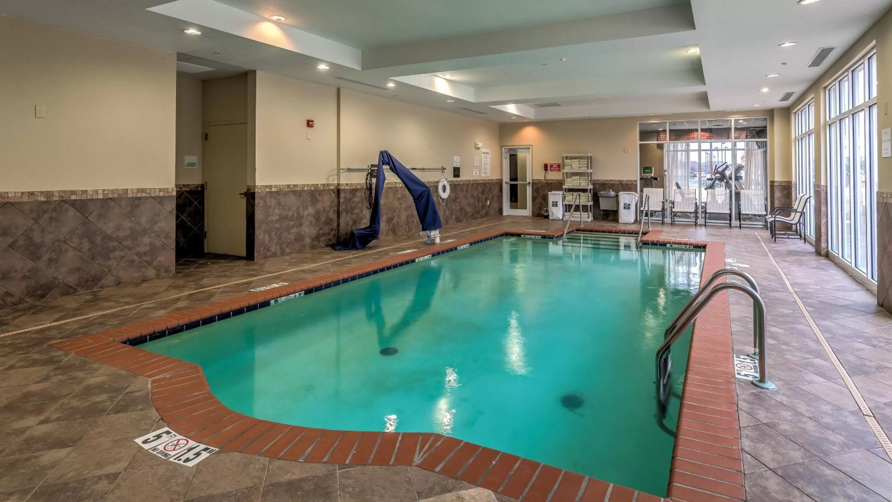 Swimming pool in Holiday Inn North Quail Springs by IHG