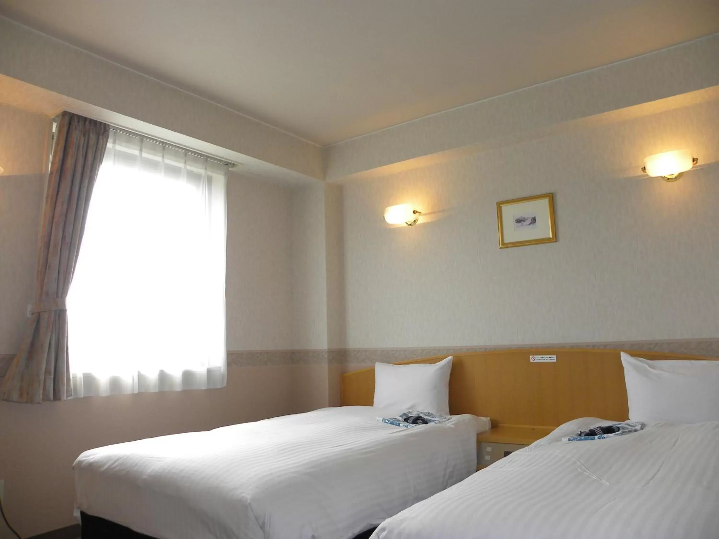 Photo of the whole room, Bed in Hotel Benex Yonezawa