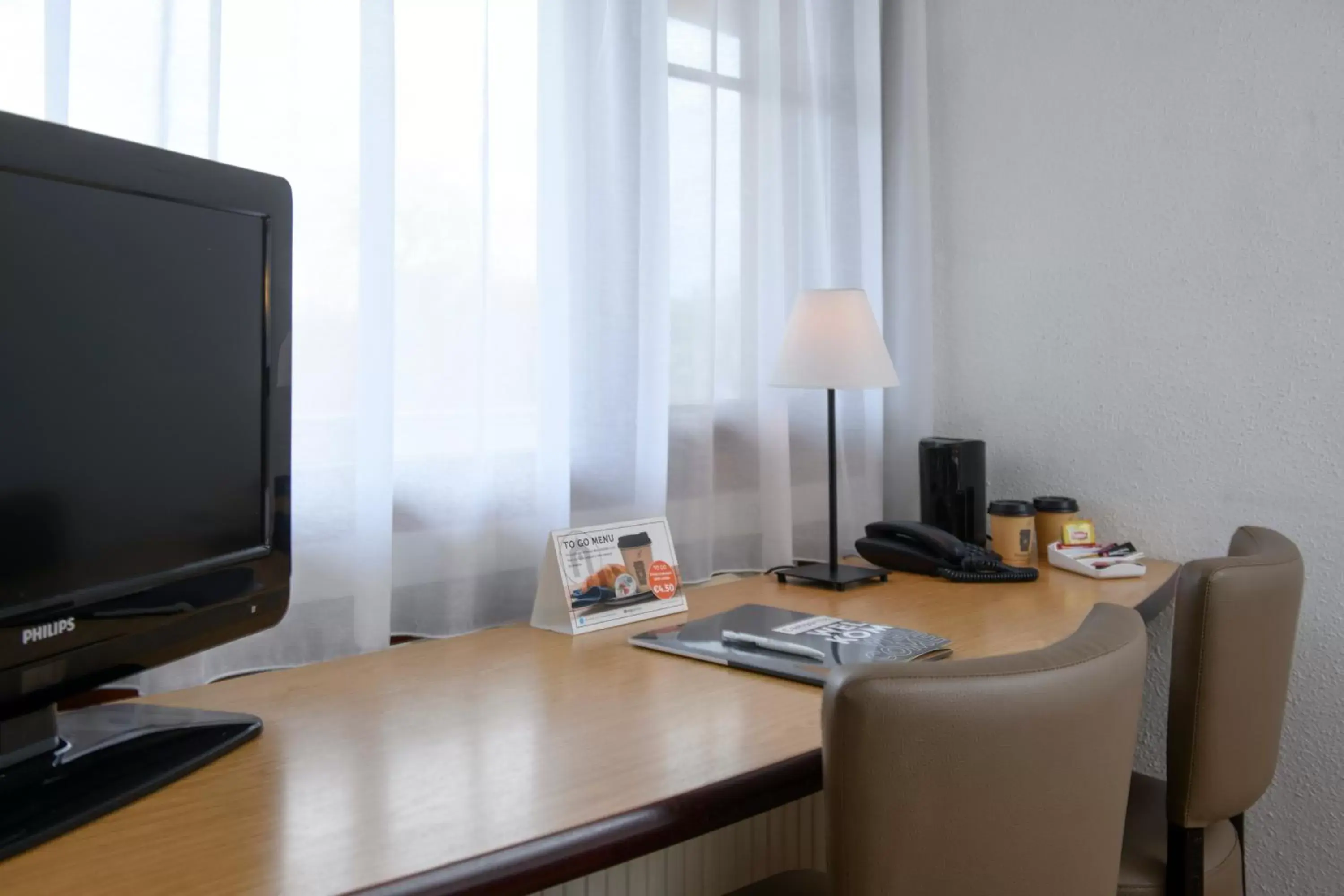 TV and multimedia, TV/Entertainment Center in Campanile Hotel & Restaurant Venlo