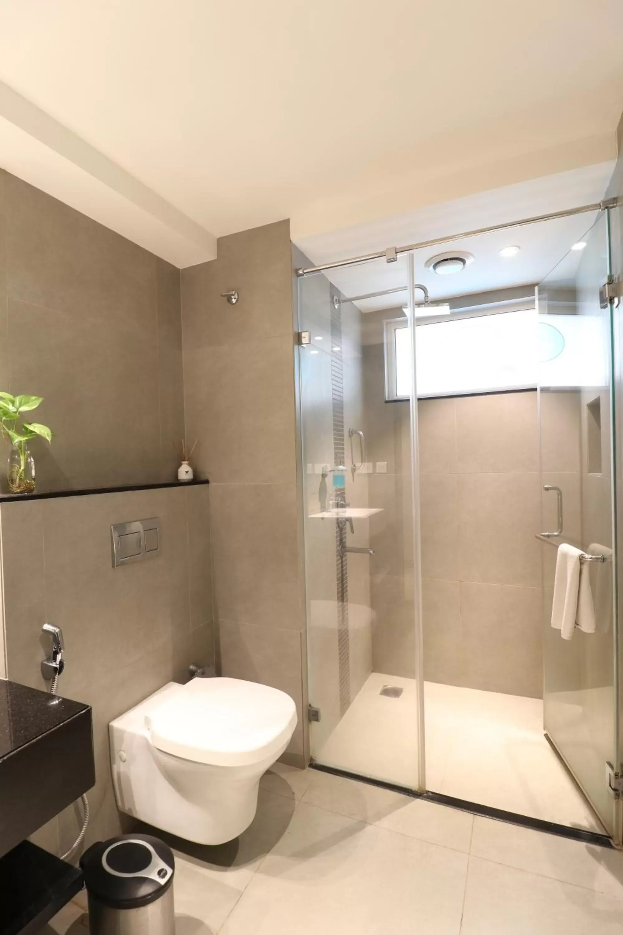 Bathroom in ZIBE Salem By GRT Hotels