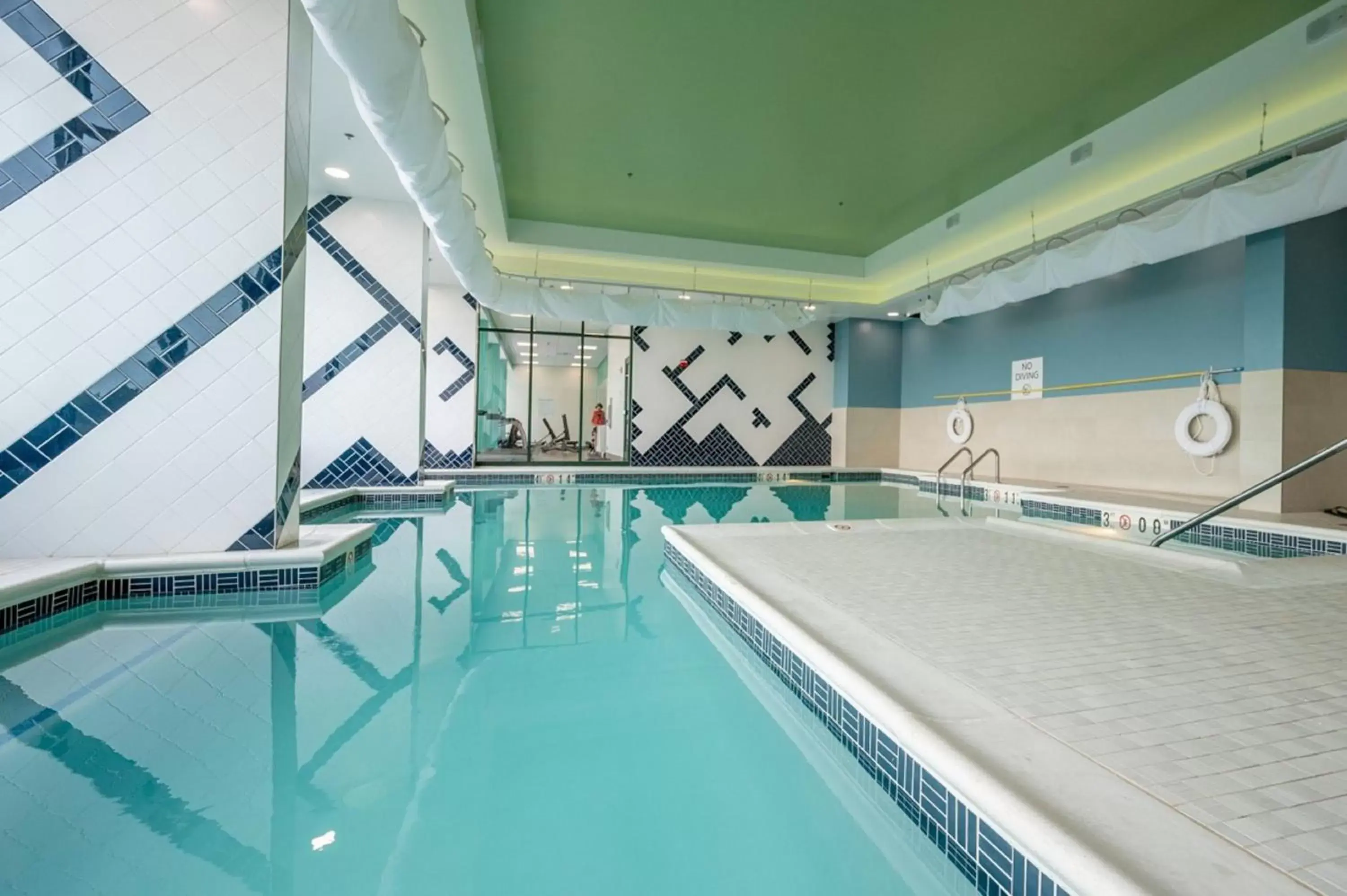 Swimming Pool in Holiday Inn Express Hotel & Suites Virginia Beach Oceanfront, an IHG Hotel