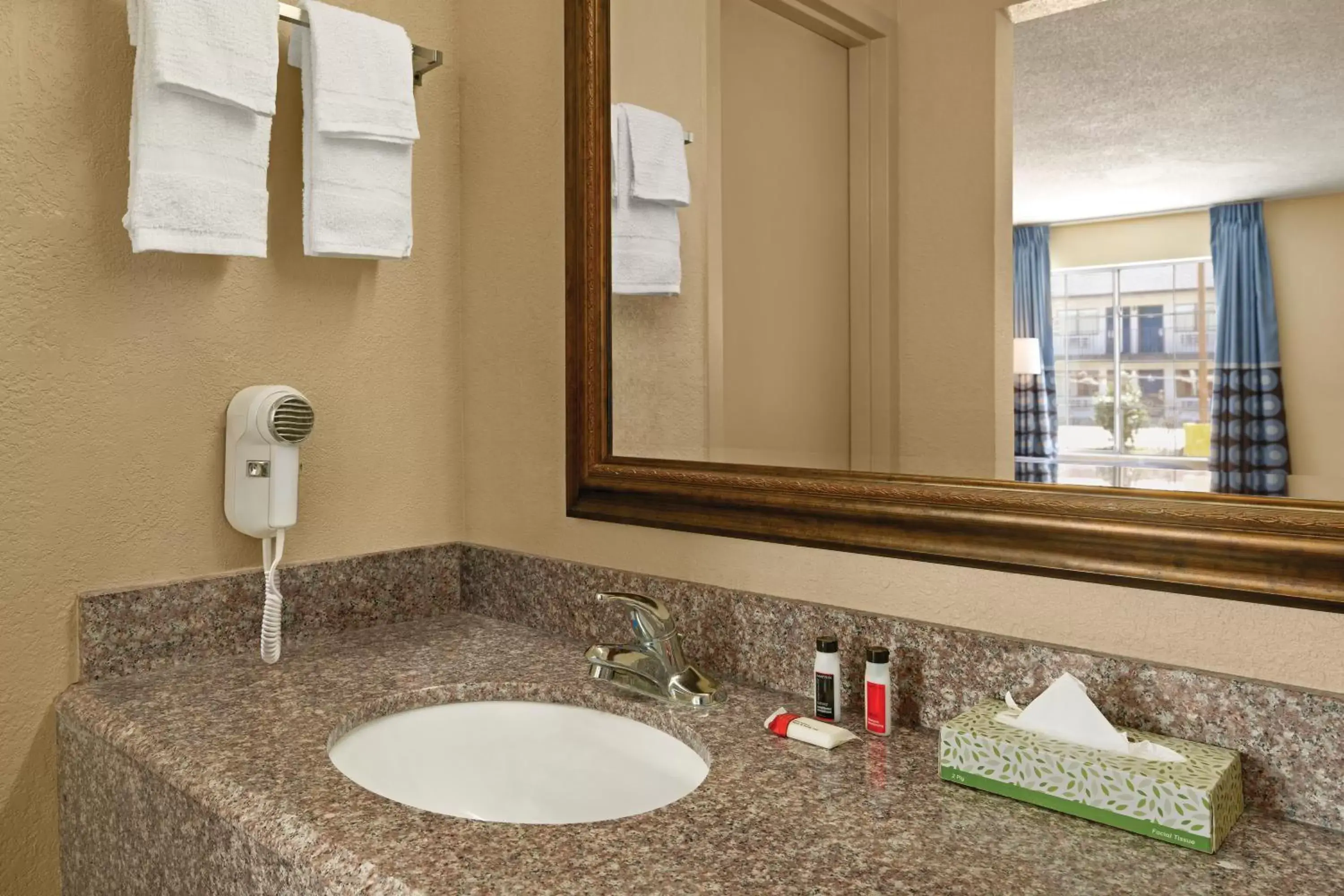 Bathroom in Super 8 by Wyndham Gulfport Near Biloxi