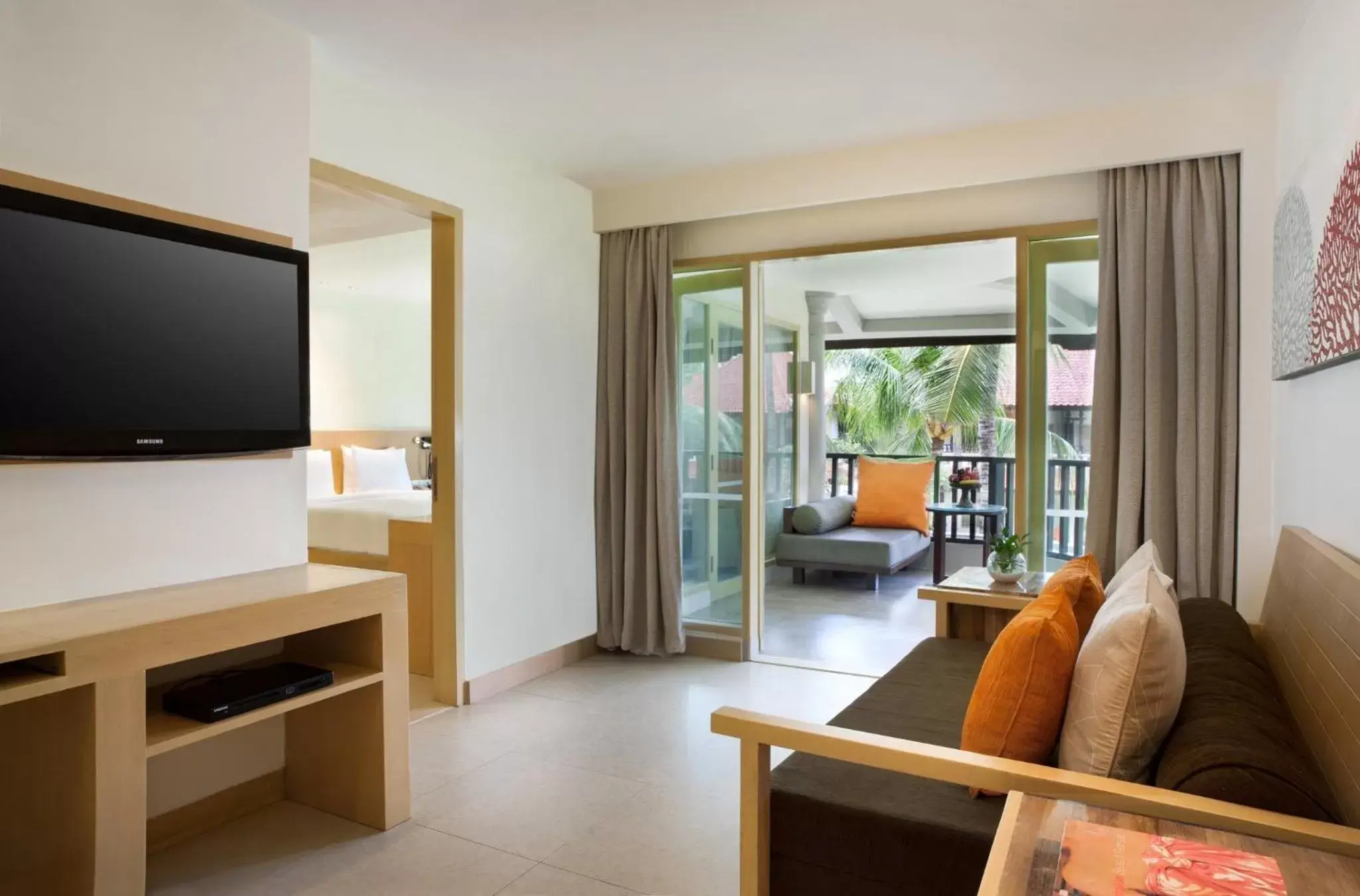 Photo of the whole room, TV/Entertainment Center in Holiday Inn Resort Baruna Bali, an IHG Hotel - CHSE Certified