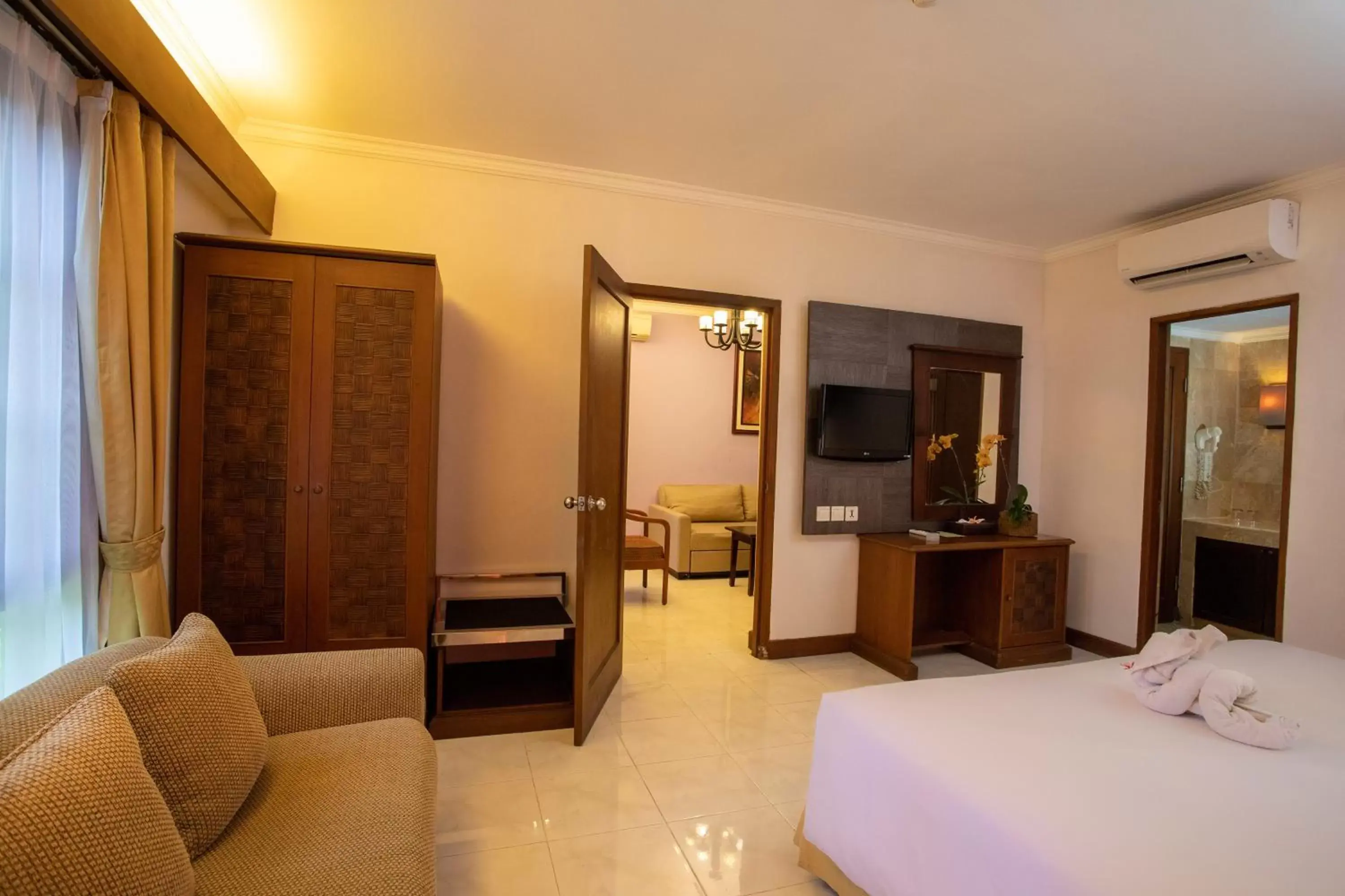 Bedroom, TV/Entertainment Center in Risata Bali Resort & Spa