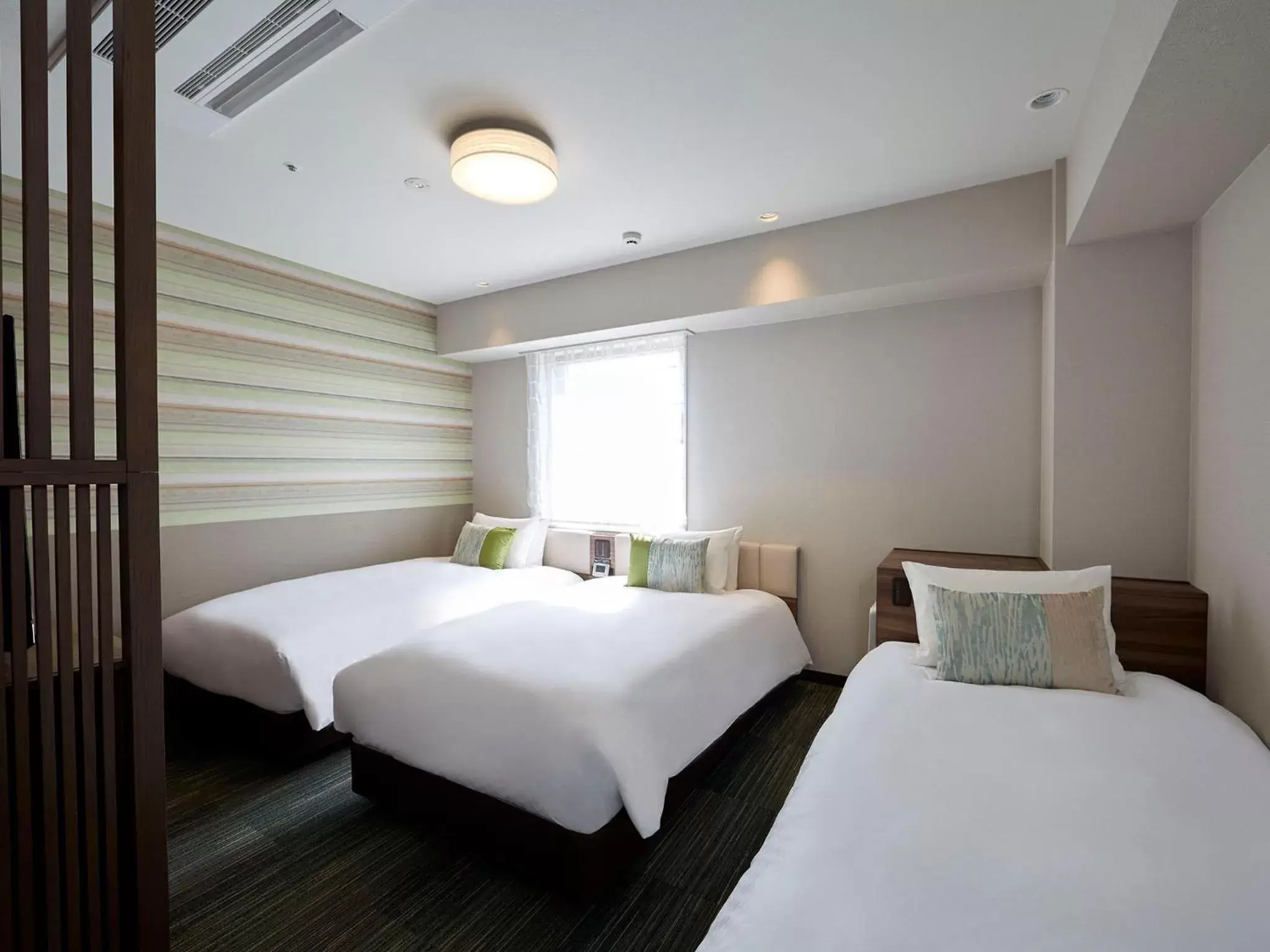 Photo of the whole room, Bed in Hearton Hotel Shinsaibashi Nagahoridouri