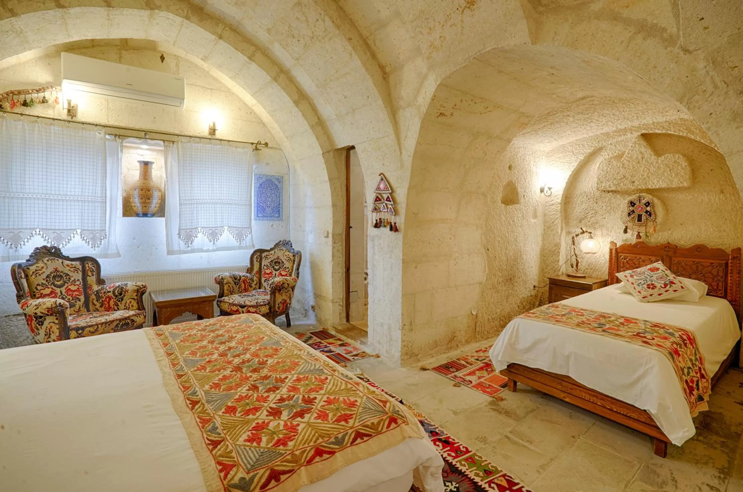Bed in Tulip Cave Suites