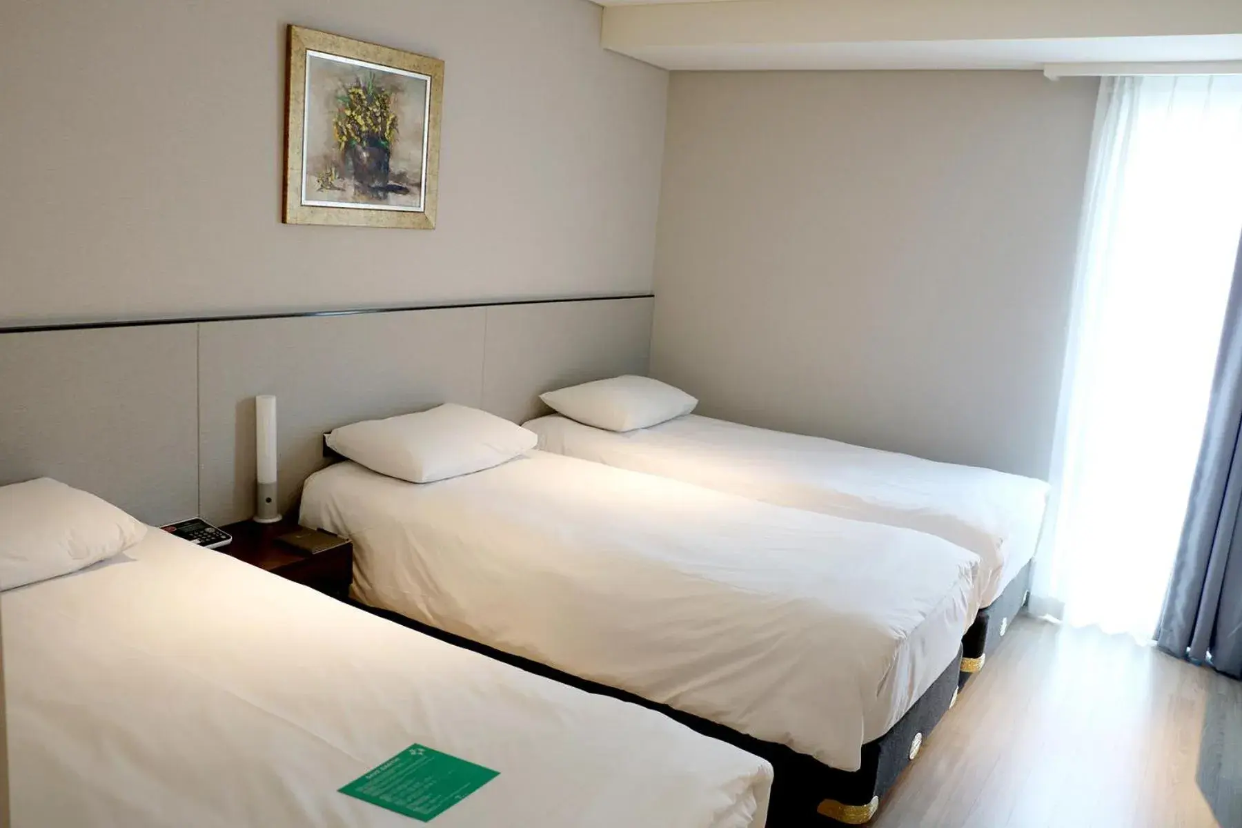 Bed in Hotel Thomas Myeongdong