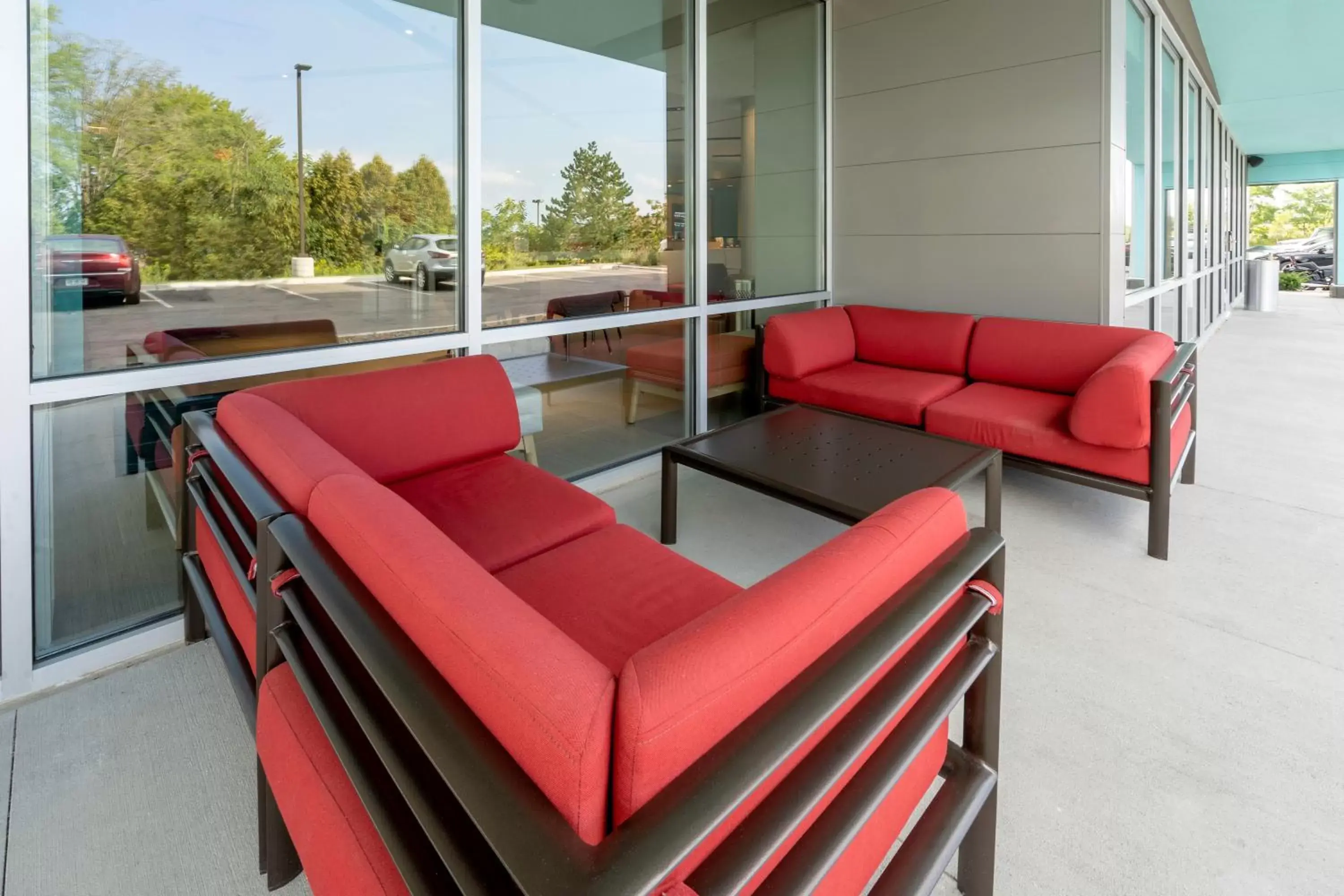 Patio, Seating Area in avid hotels Milwaukee West - Waukesha, an IHG Hotel